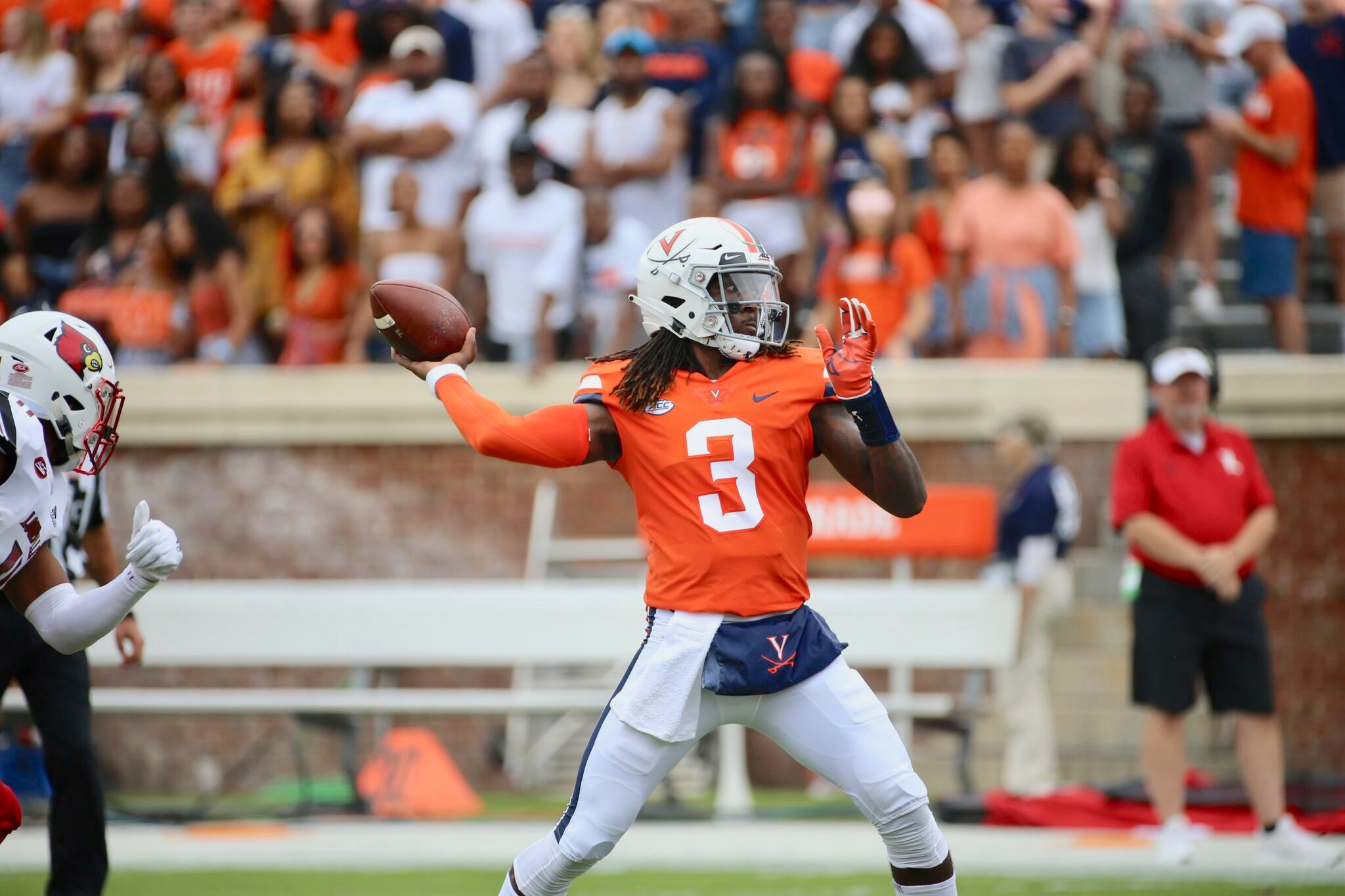 Quarterback Bryce Perkins throws the ball down the field during a game