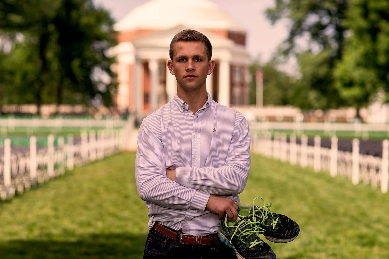 Recent UVA grad Sam Hitch runs on the Lawn in preparation for a cross-country triathlon that he will attempt this summer in order to raise money and awareness for pancreatic cancer research. 
