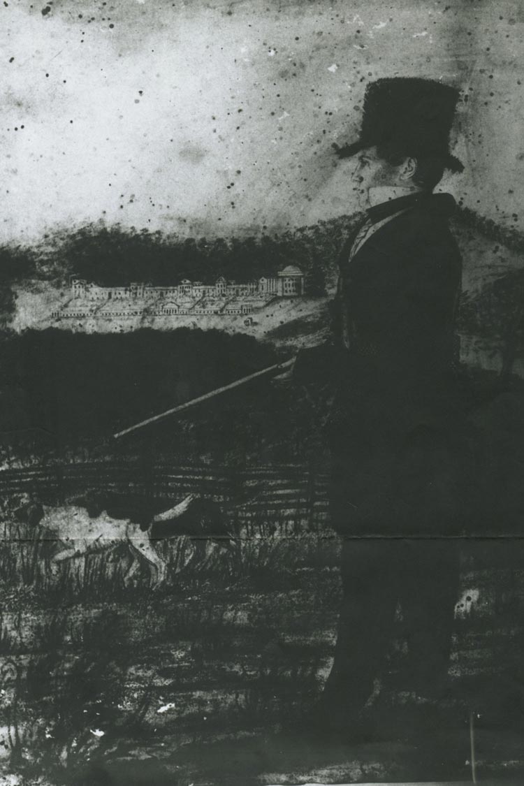 Black and white image of a person and buildings in the background. 