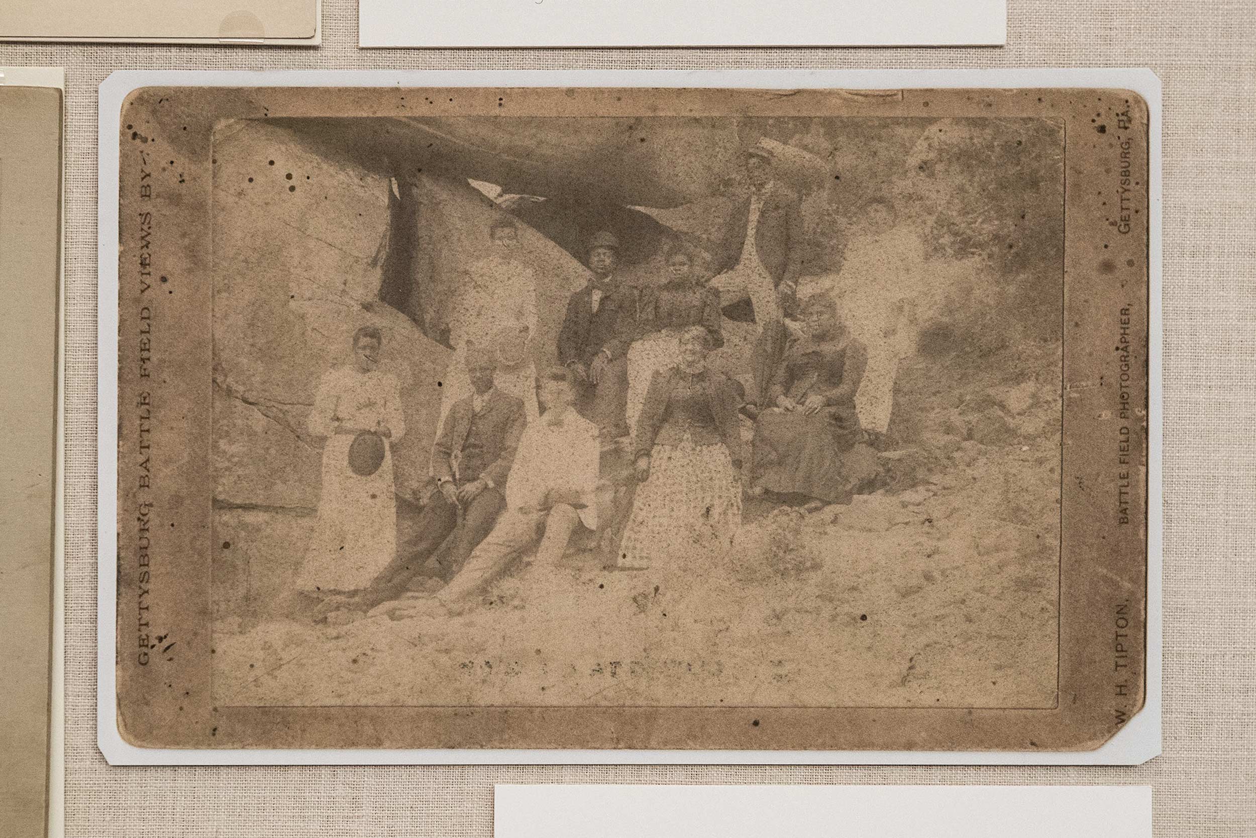 facsimile of an album in print circa 1890s of a group of black tourists visiting Gettysburg Battlefield.