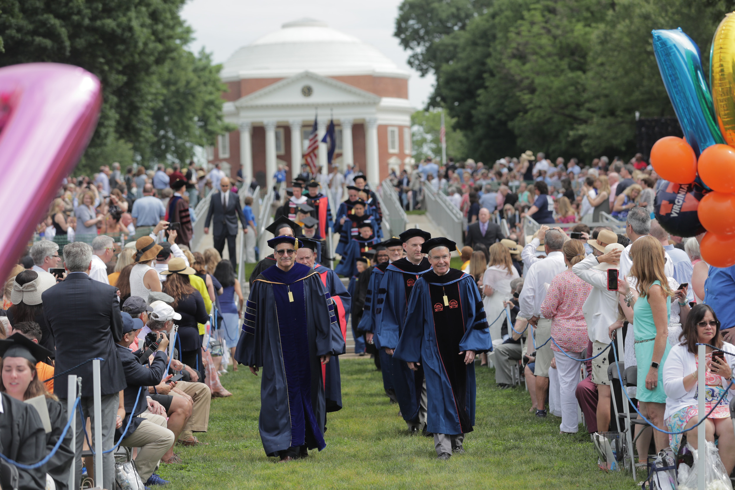 UVA executive members walk down the aisle on the Lawn