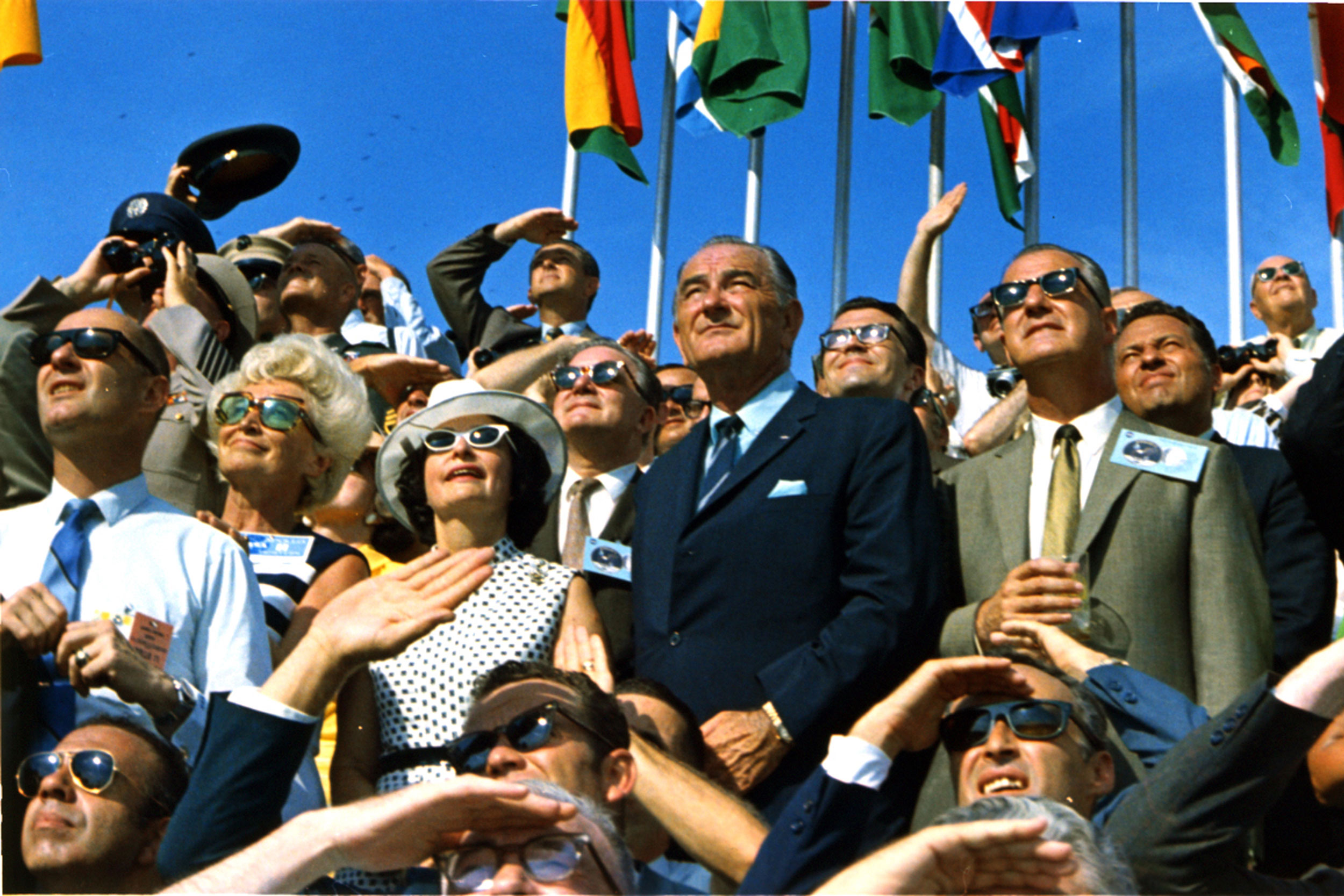 Lyndon Johnson, center,lady Lady Bird Johnson, left, watch Apollo 11 launch with Spiro Agnew, right