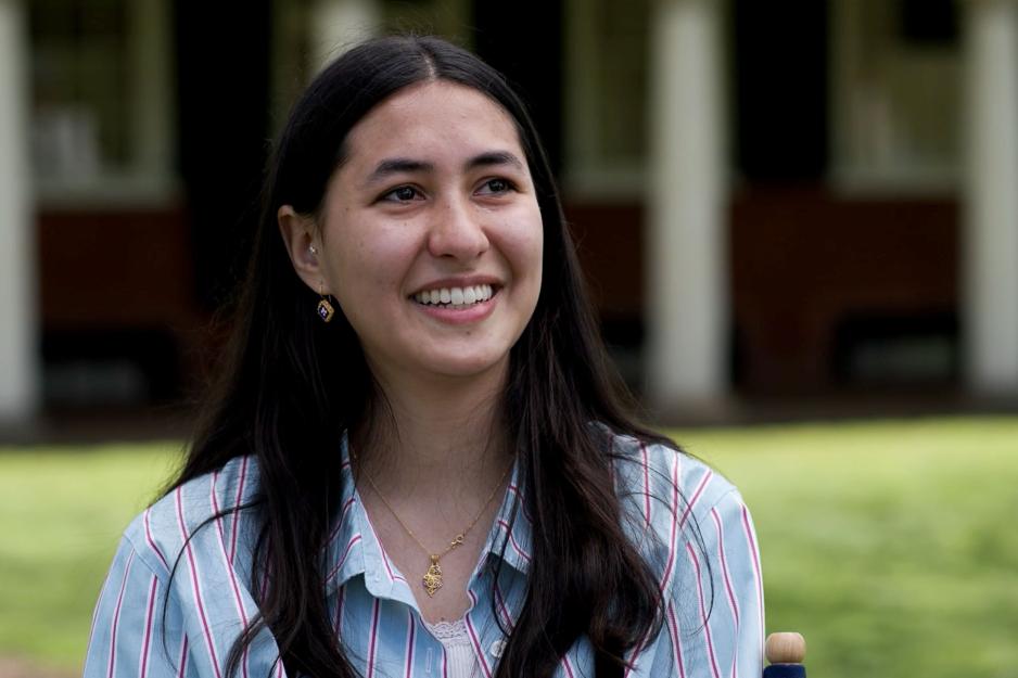 Katrina Amistad smiles on the lawn at interviewer
