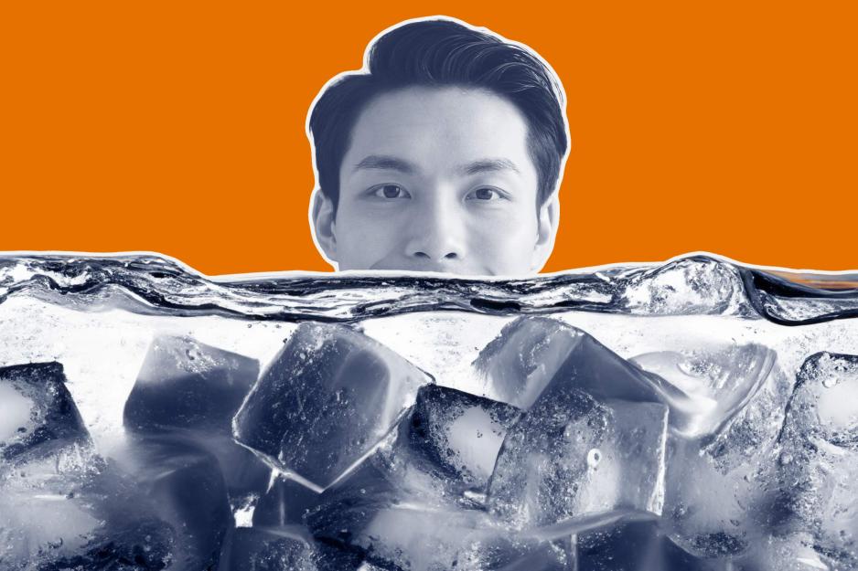 A man's face peers over some ice cubes in a photo illustration