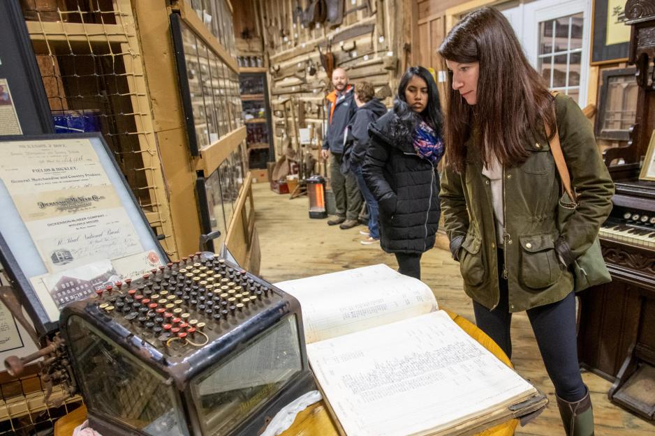 Christine Mahoney examines railroad and coal mining artifacts at the at the Mountain Heritage Museum in St. Paul, Virginia.