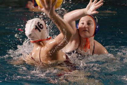 Womans Water polo team playing a match