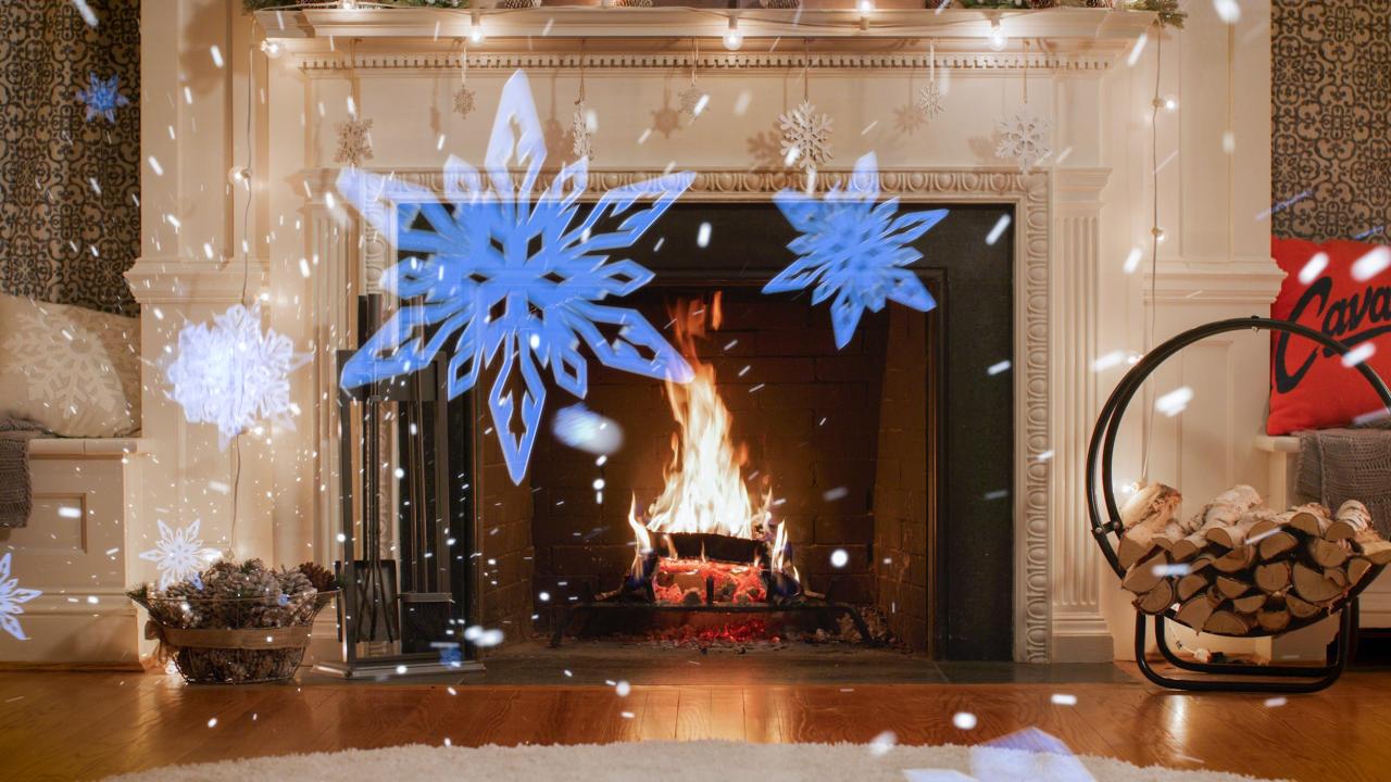 Fireplace with fake snow flakes falling down