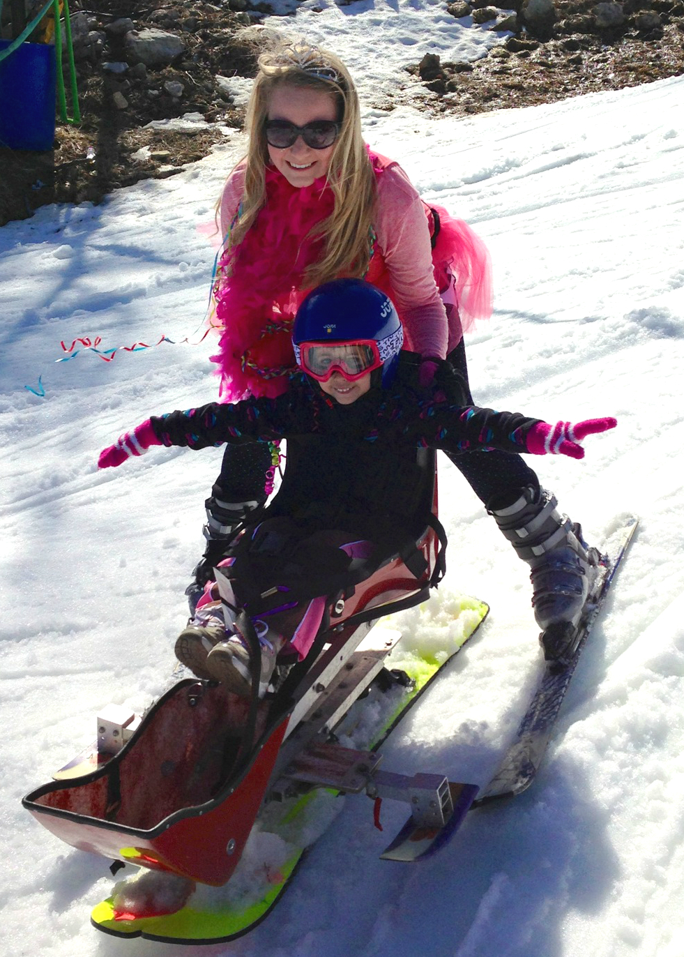 Bruno, skiing with a young client. Bruno coordinated UVA&#039;s adaptive ski program through Madison House.