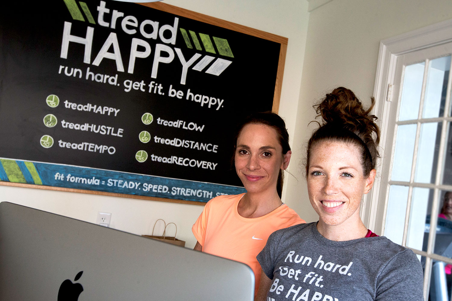 Claire Mitchell and Sara Yeatman Currier, both UVA Curry School of Education alumnae, opened their treadmill-based fitness studio, tread HAPPY, in February. 