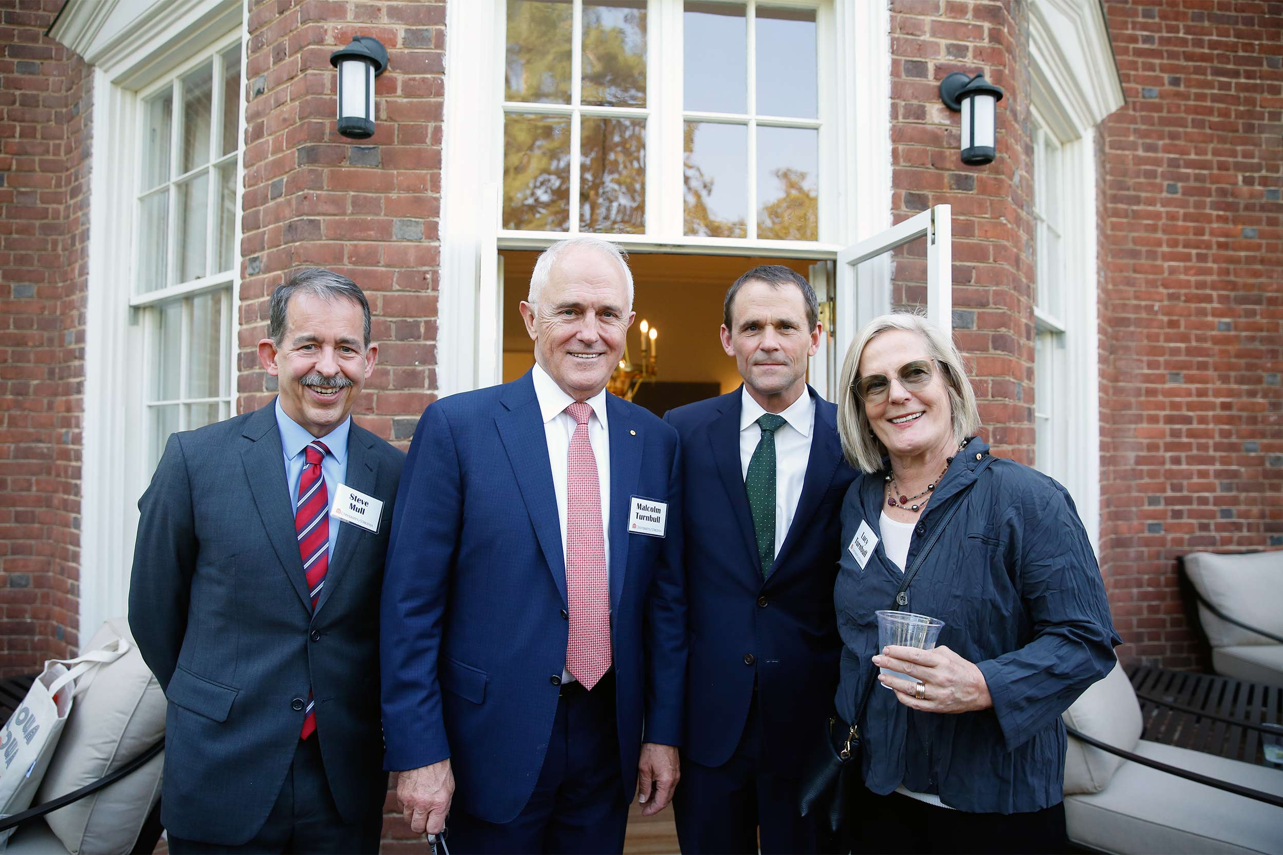 Portrait of UVA Vice Provost for Global Affairs Steve Mull; former Australian Prime Minister Malcolm Turnbull; UVA President Jim Ryan; and Lucy Turnbull