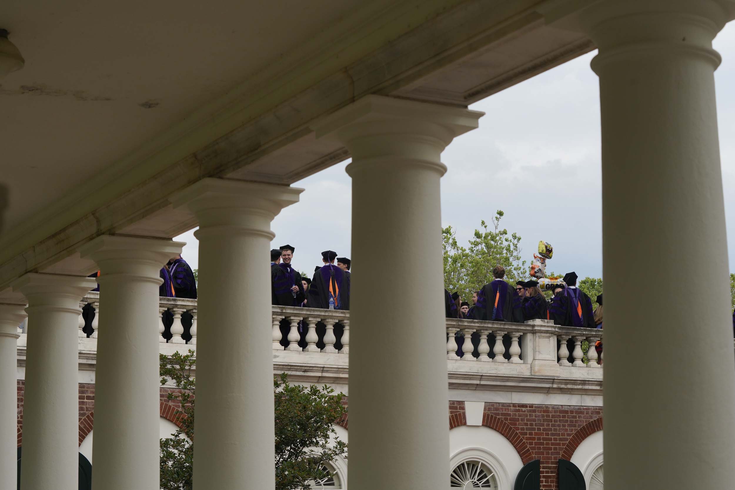 Graduates standing on the Rotunda