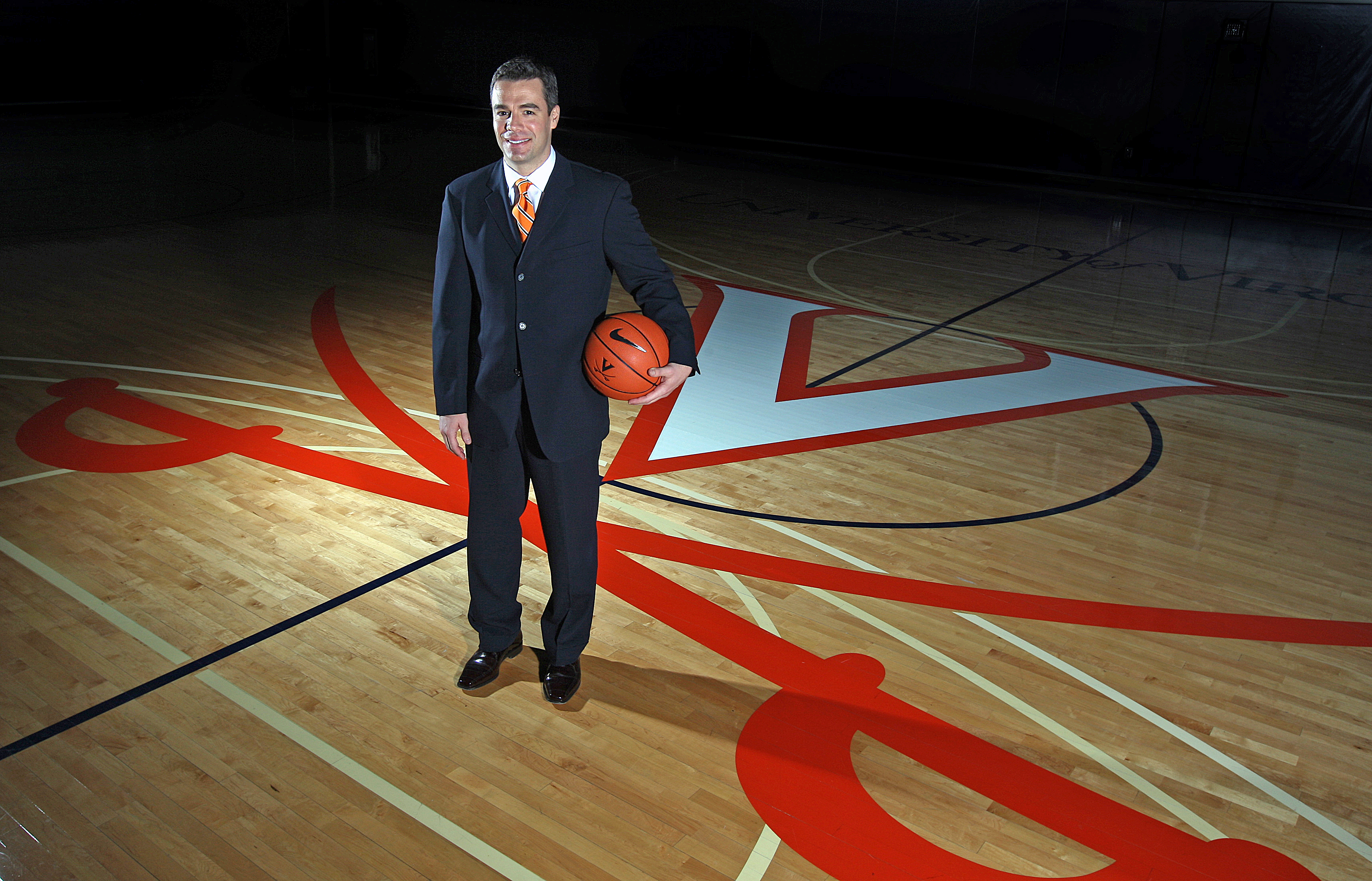 Young Tony Bennett stands on the JPJ court