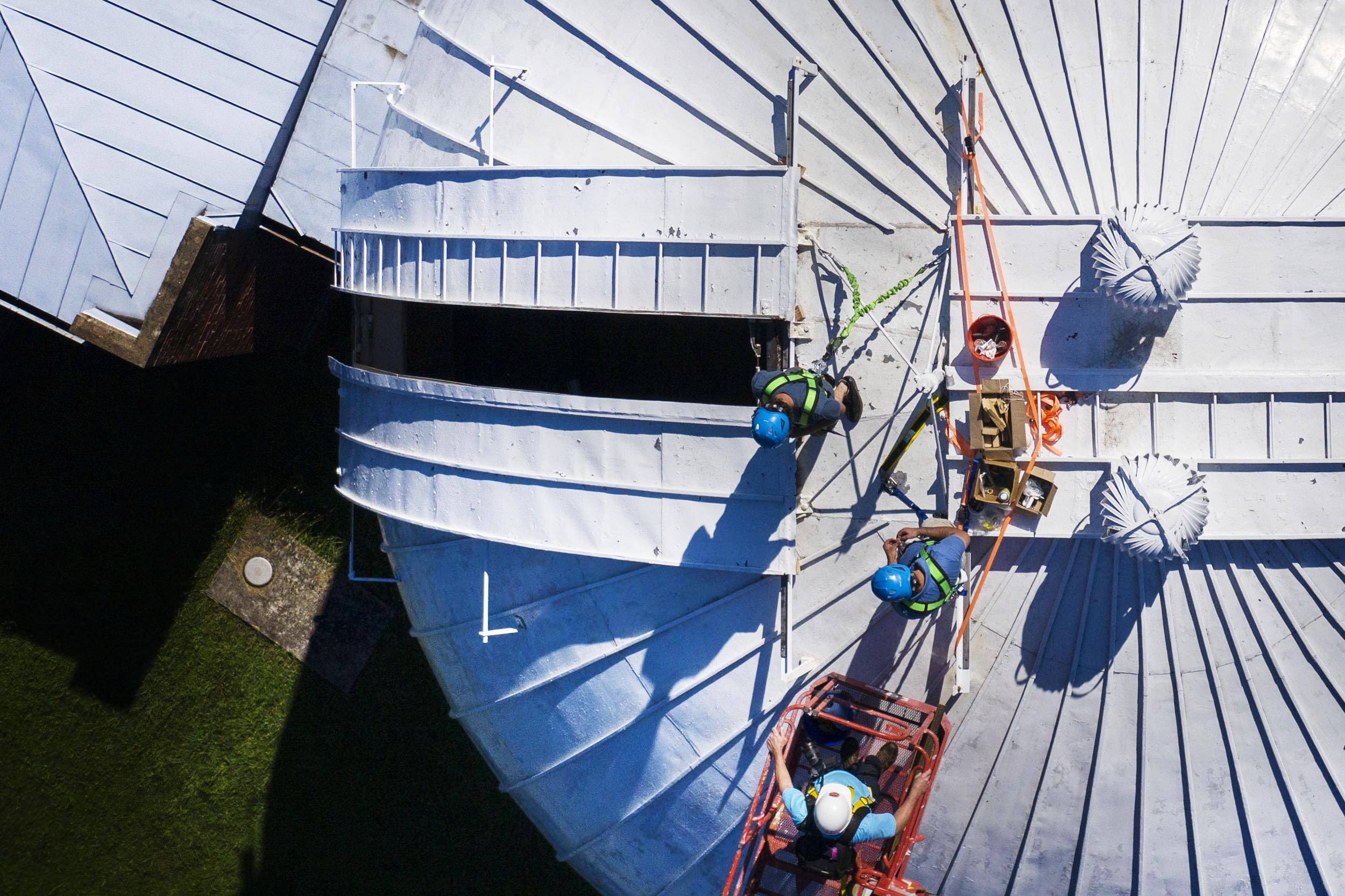 Peter Dow and Jimmy Davidson work atop the McCormick Observatory dome