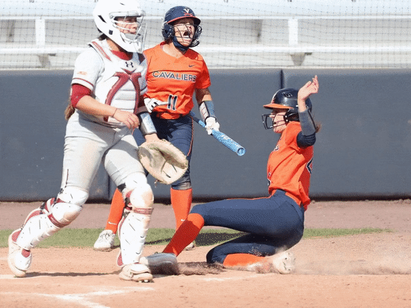 UVA Womens softball player slides into homeplate