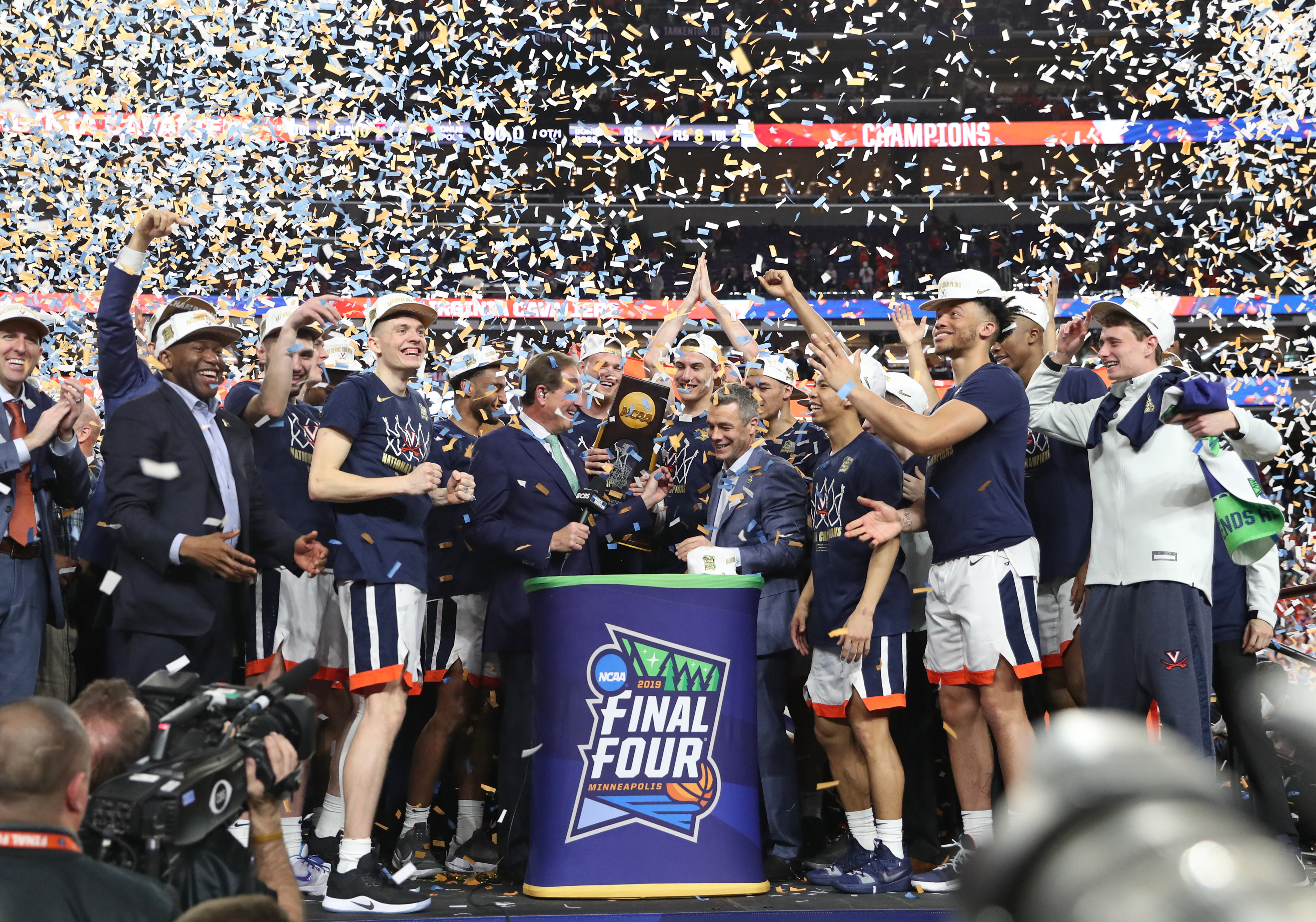 Confetti covers the 2019 team after winning the championship