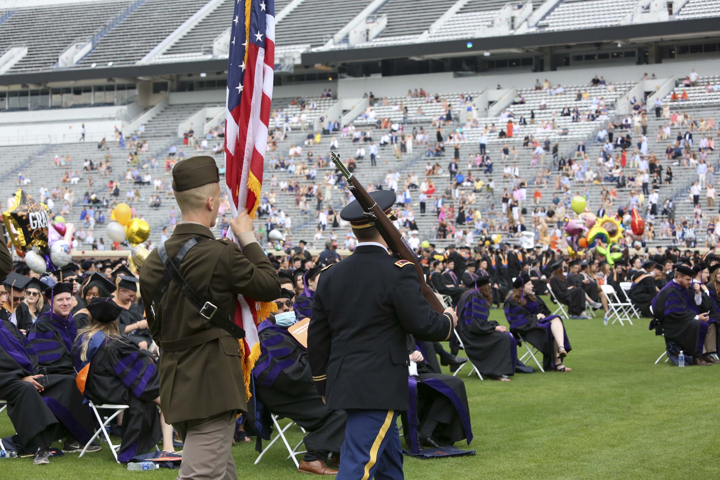 US Military Color Guard processing in carrying the United States of America's flag