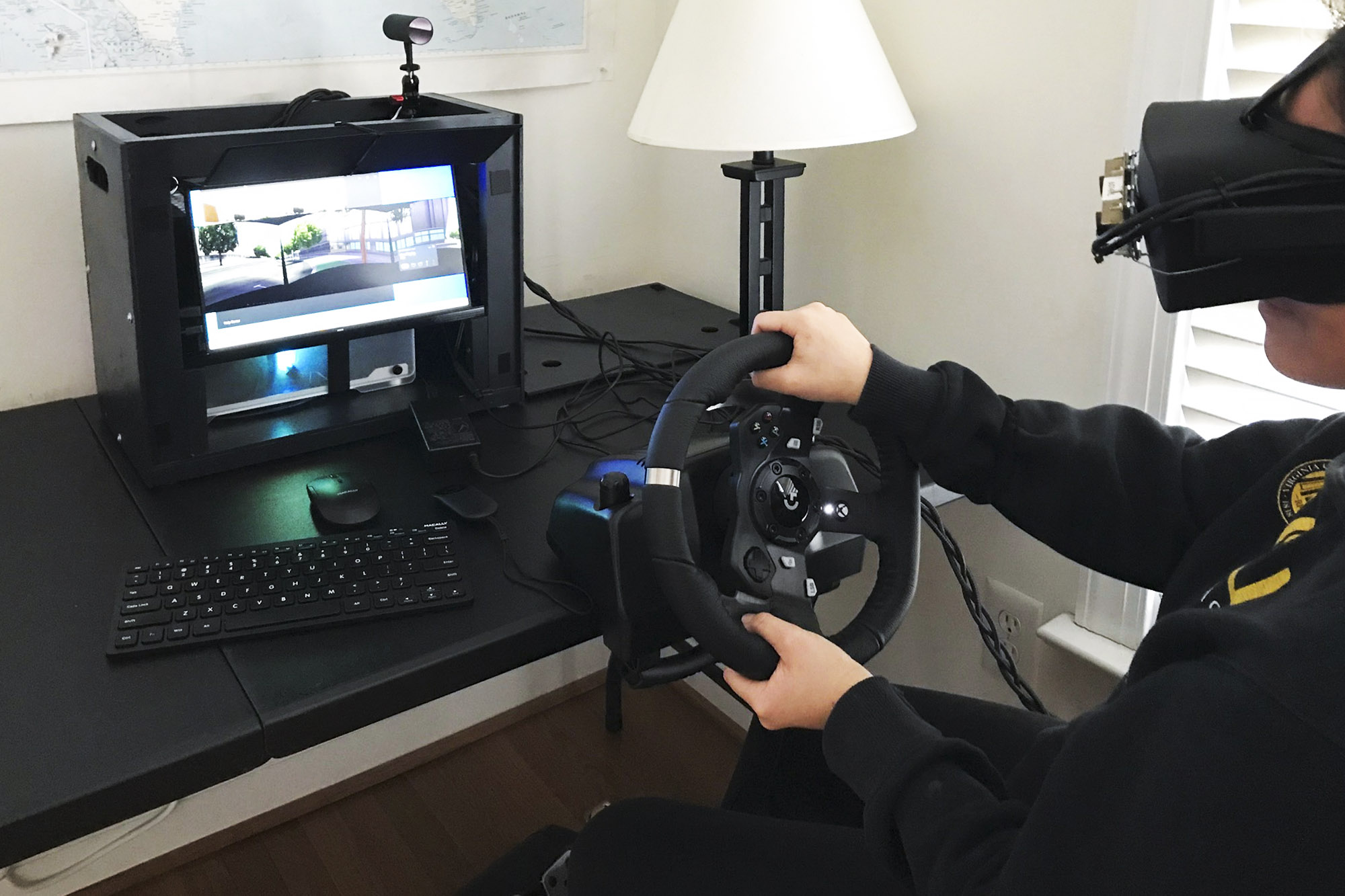 Student using UVA's VR driving simulator
