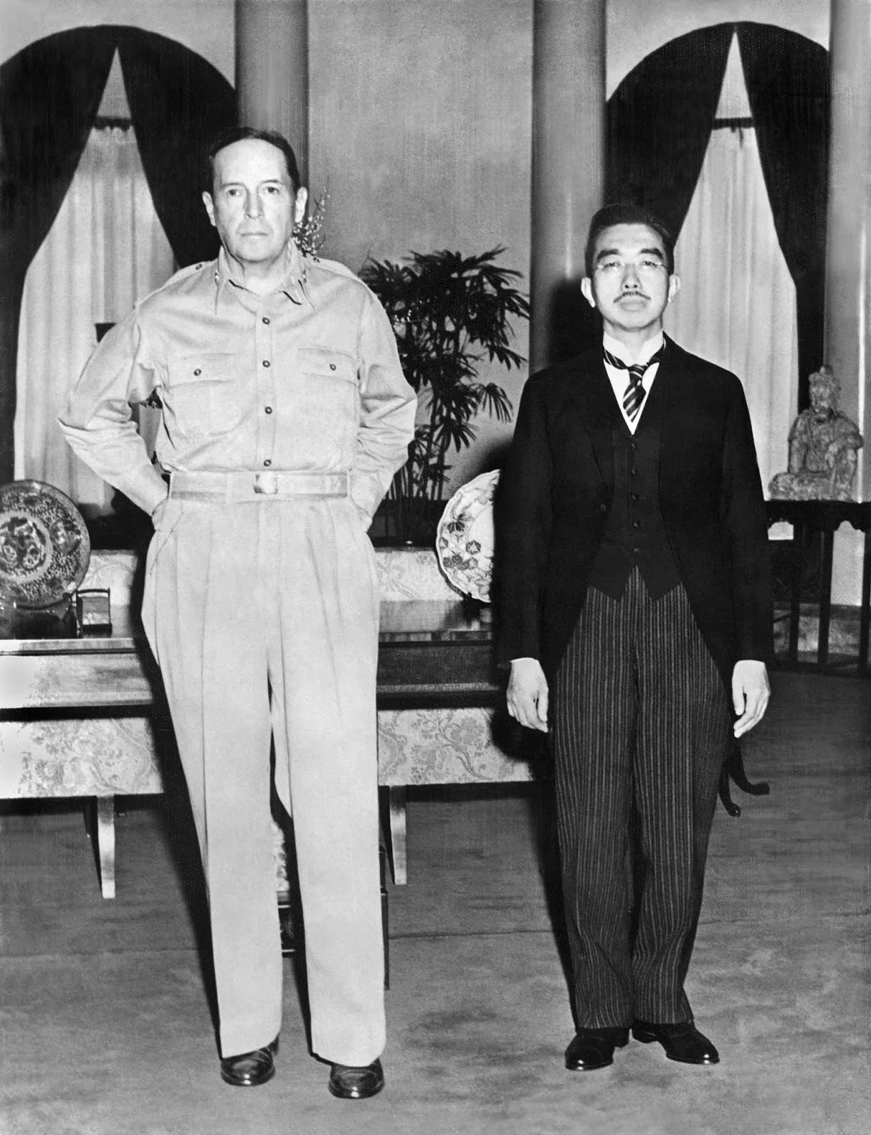 U.S. Army Gen. Douglas MacArthur  (left) and Japanese Emperor Hirohito (right)