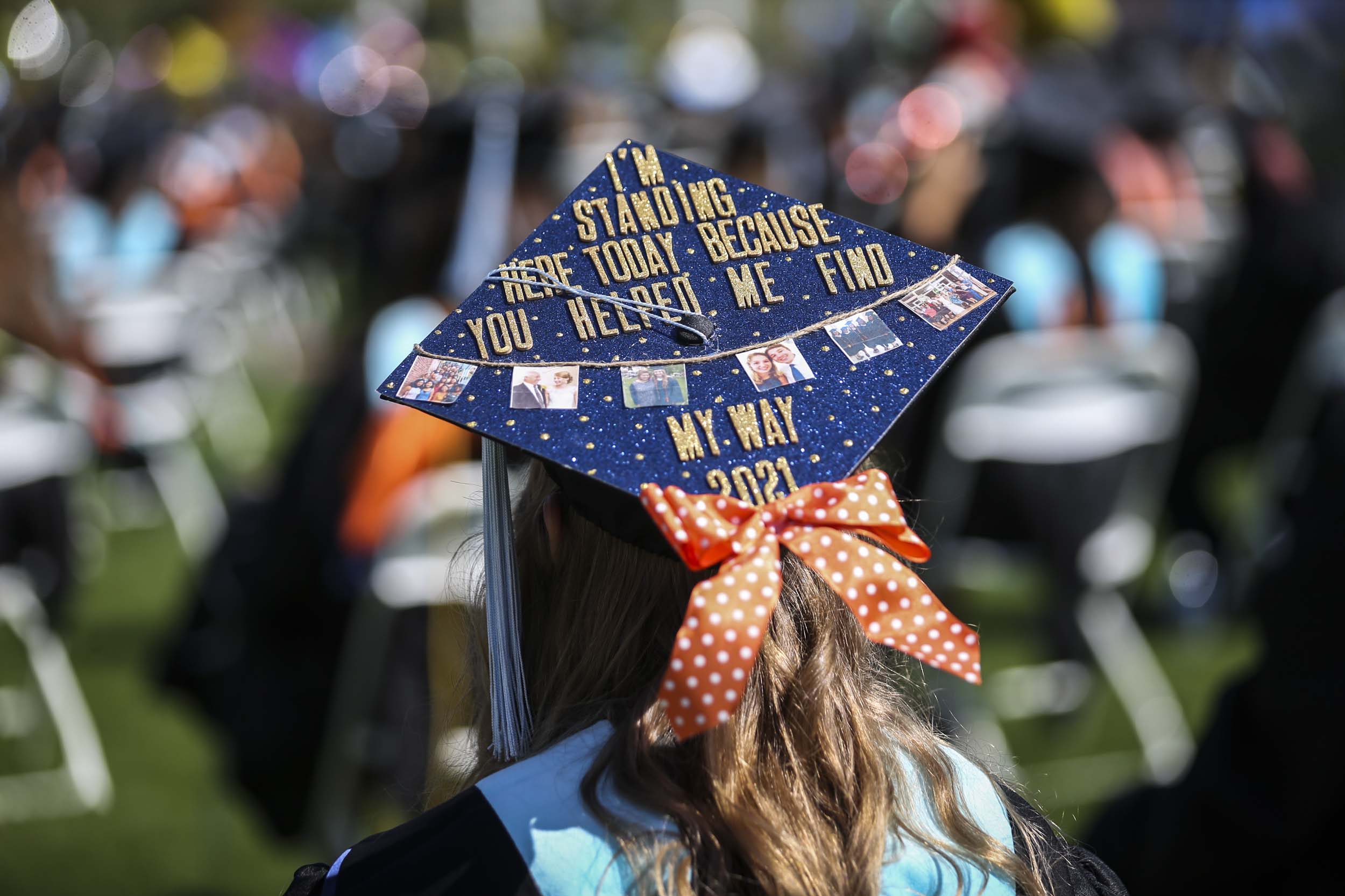 Graduates hat that reads I'm standing here today because you helped me find my way 2021