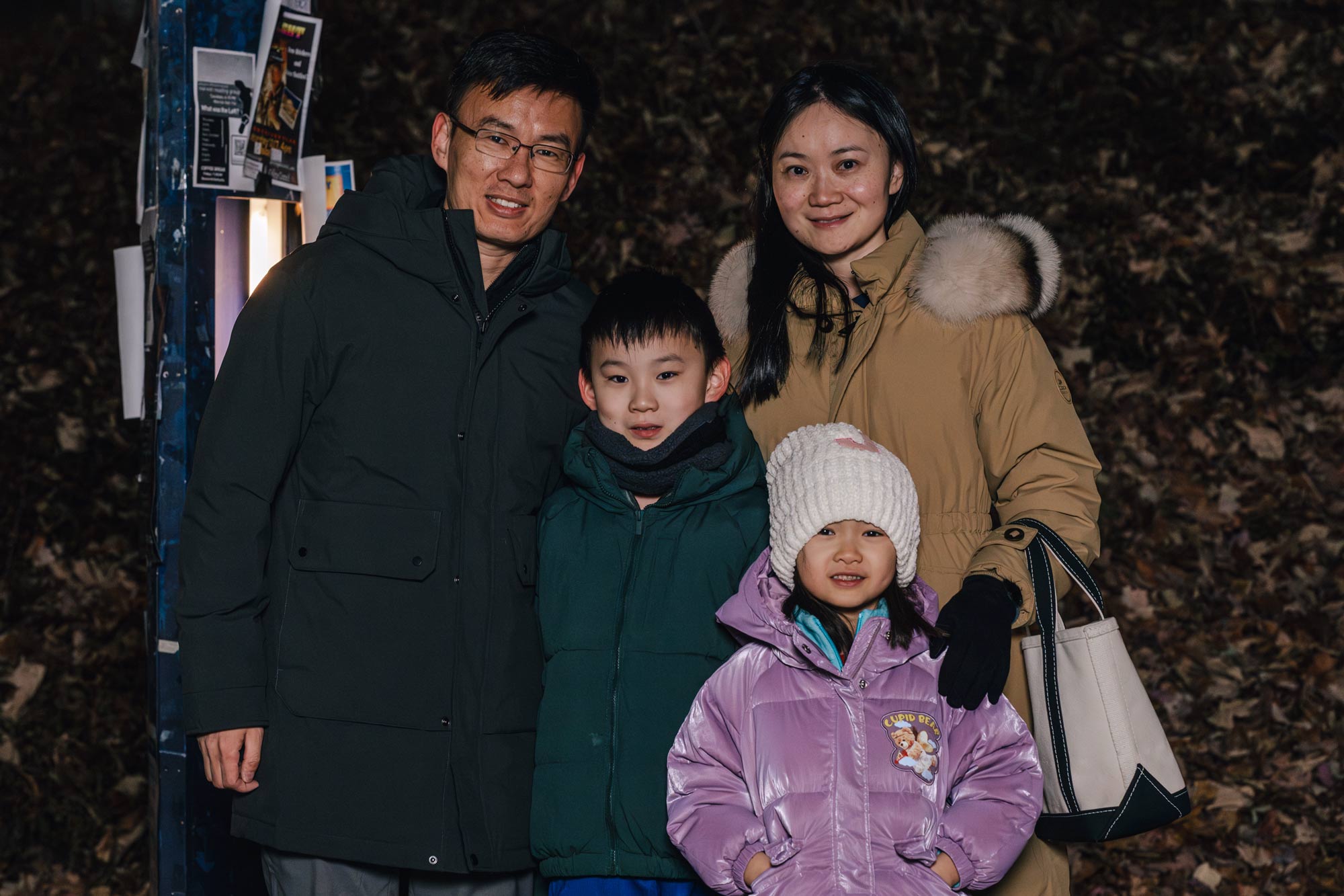 Yuxiang Du, children Vincent and Alice, and mother Wan Wan pose for a picture 