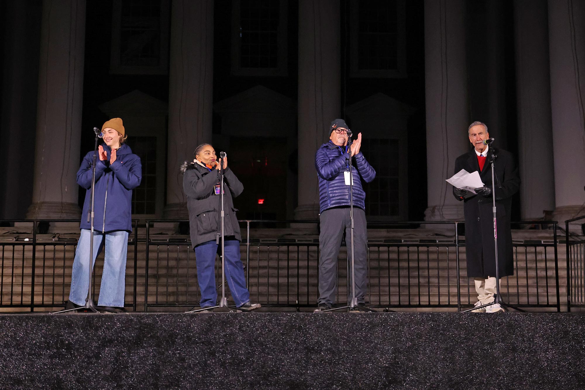 The poem readers were fourth-year student and silver-medal Paralympian Skylar Dahl, Senior Associate Dean of Students Vicki Gist, University Professor of Politics Larry Sabato, and Phillip Bourne, the founding dean of the School of Data Science. 