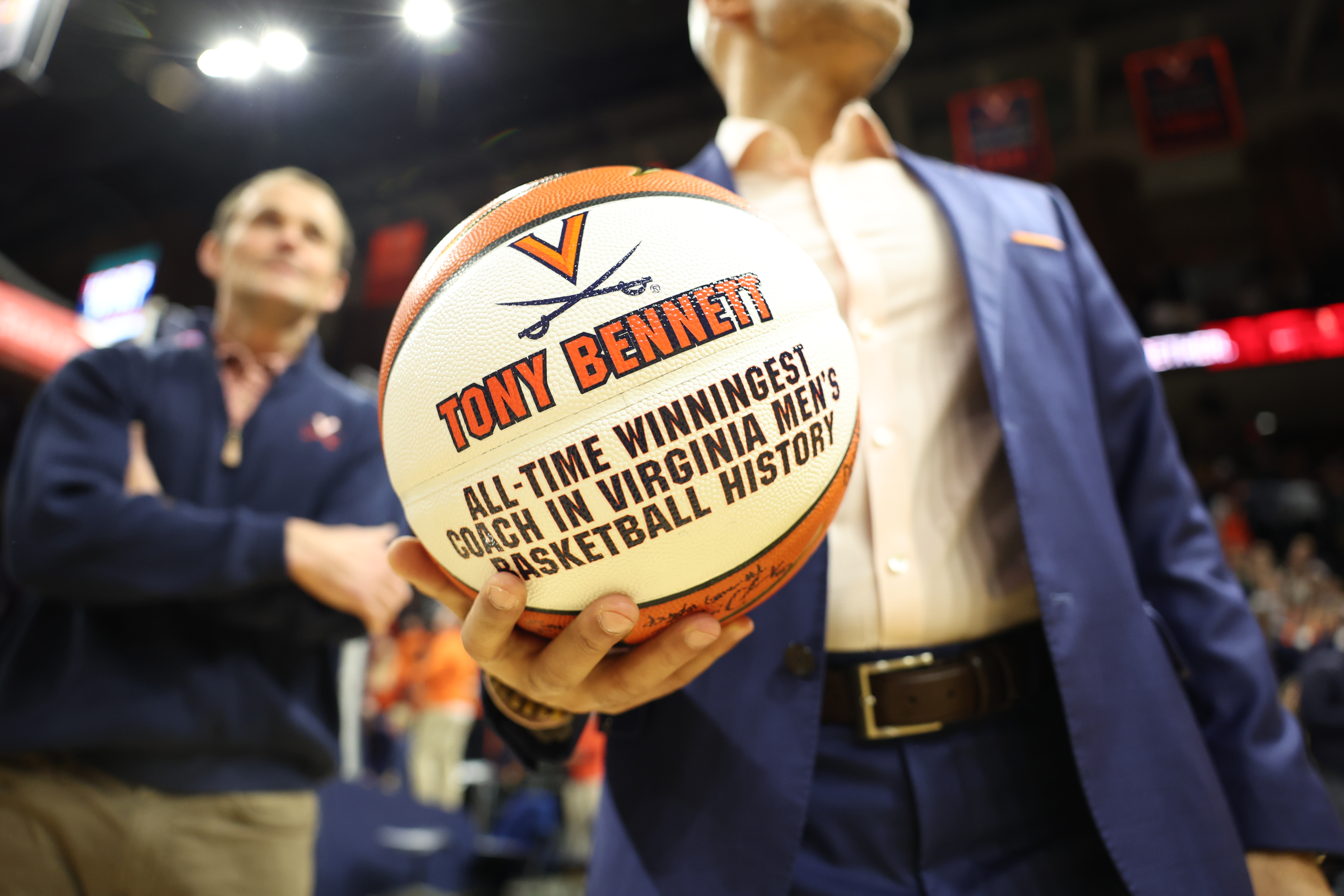 A close up of the 2023 basketball indicating he is the most winningest coach