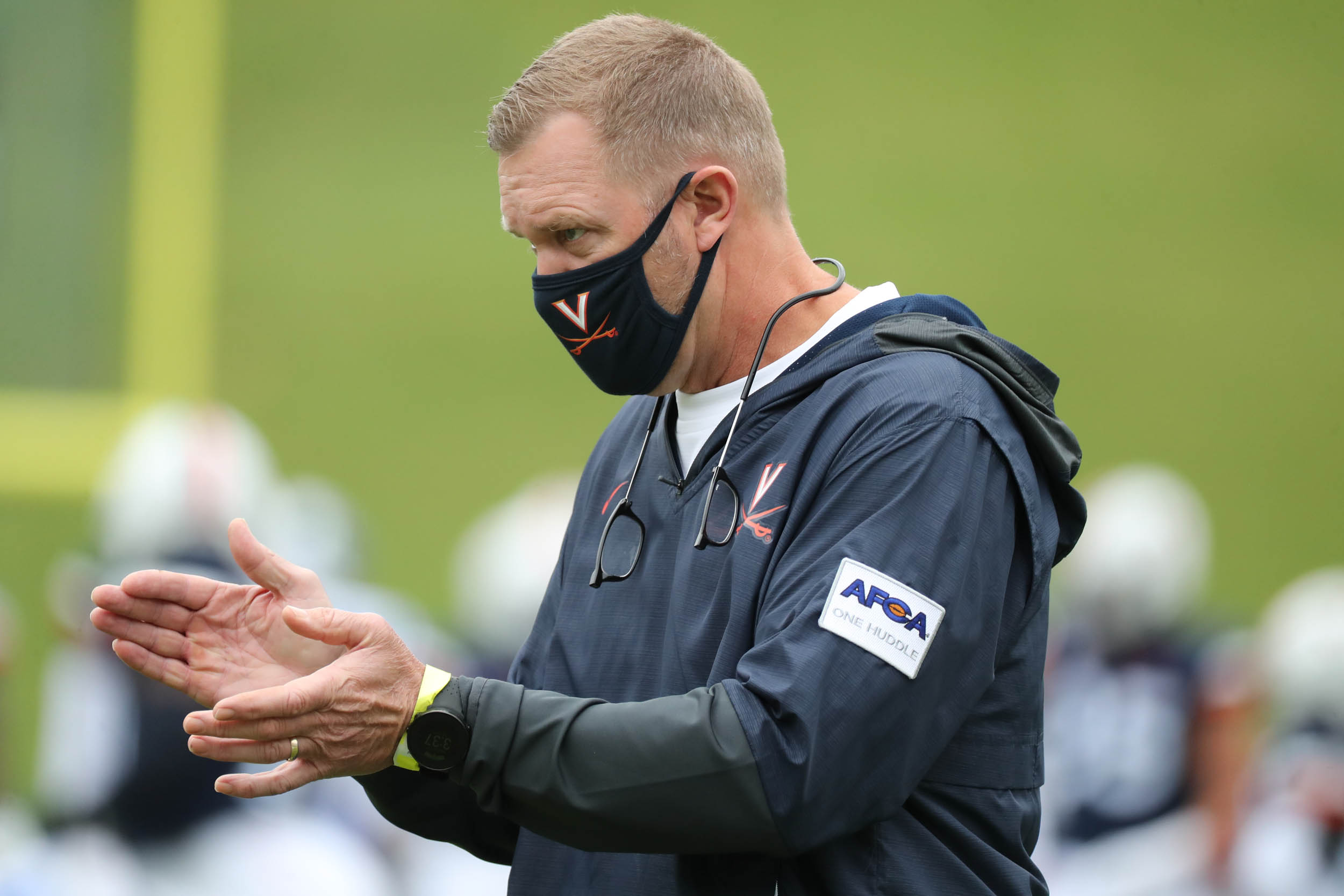  Bronco Mendenhall  clapping on the sidelines