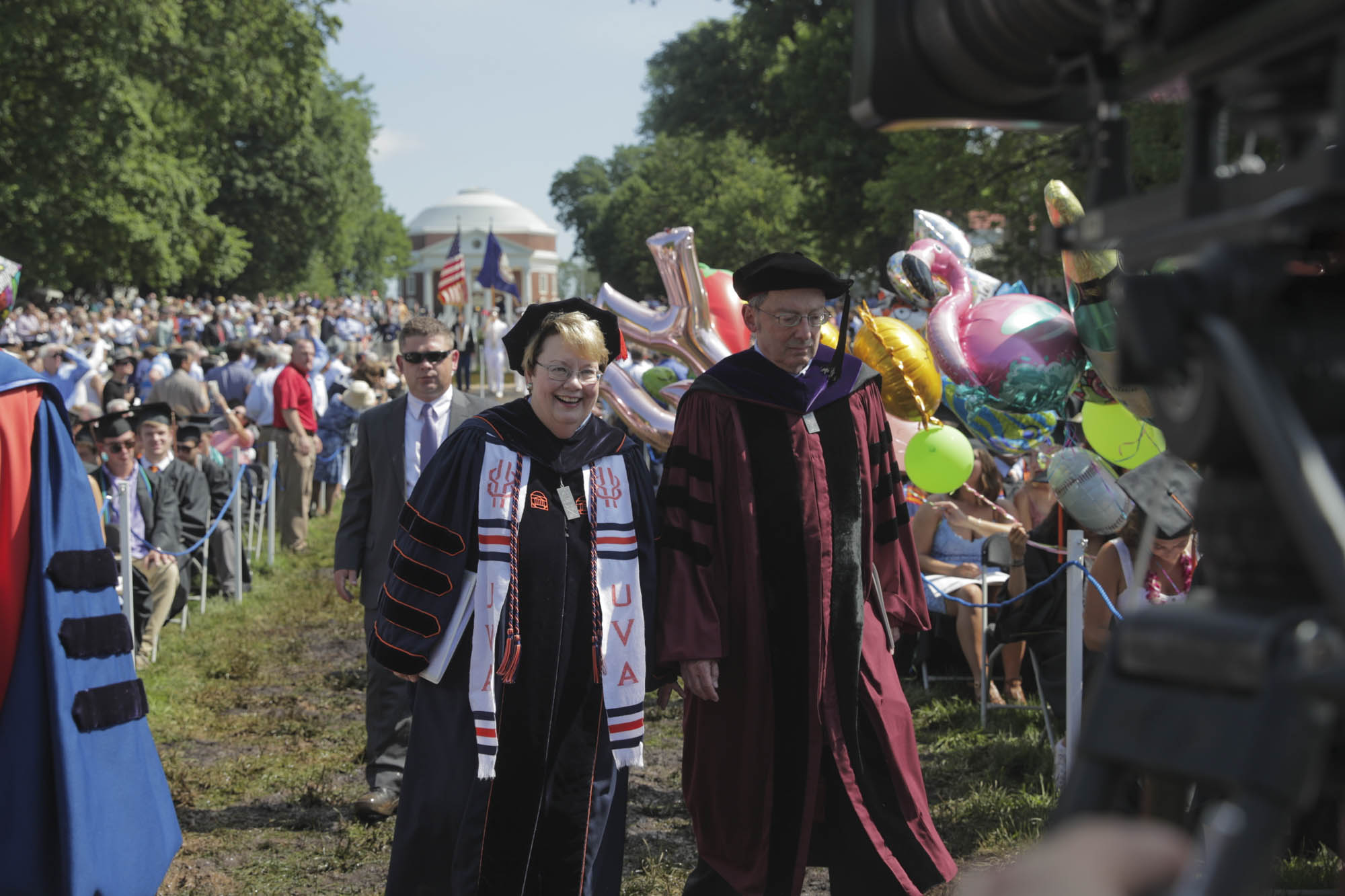 UVA Leadership walking up onto the stage