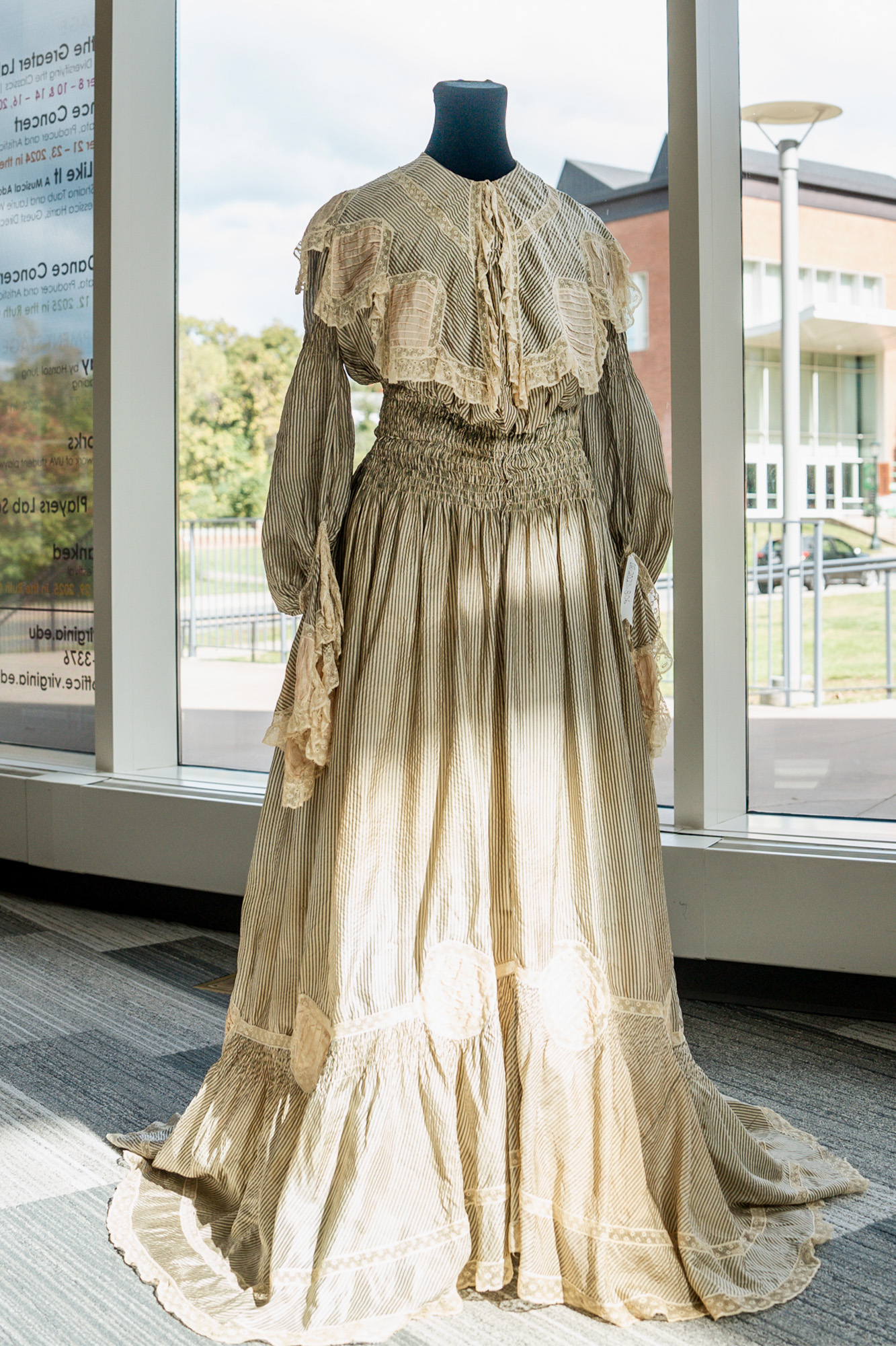 Full length view of a dress from the early 20th century.