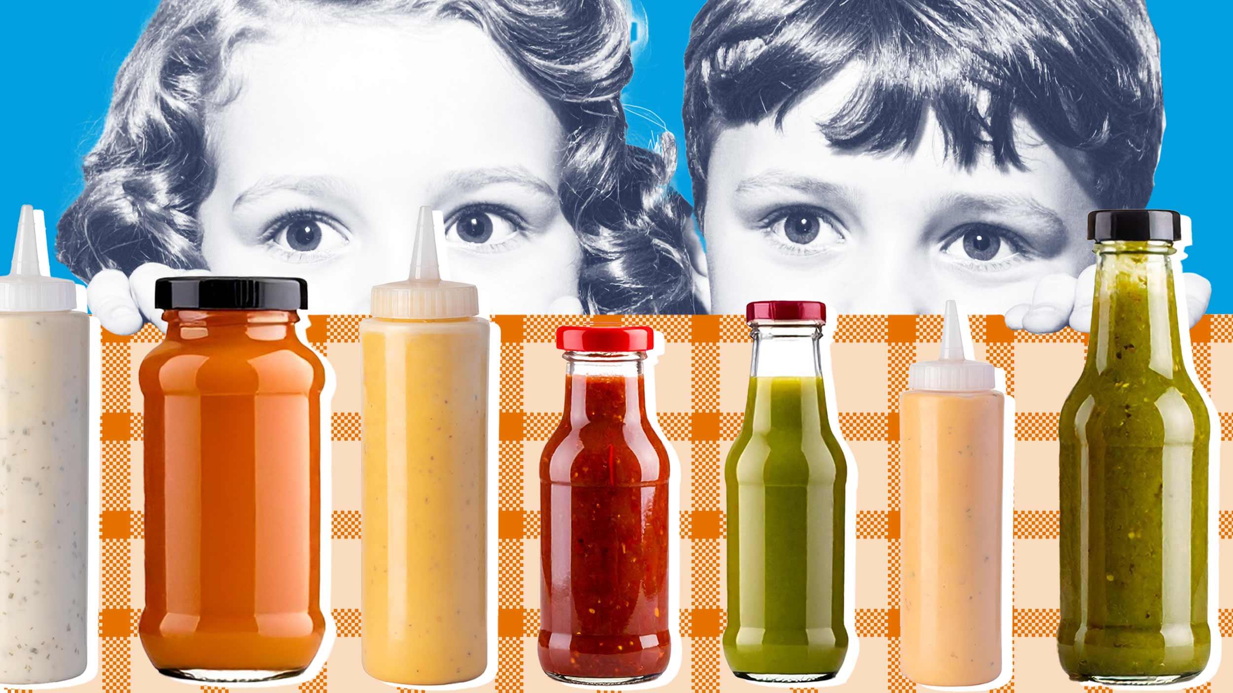 Two children looking over the edge of a table at a variety of condiments