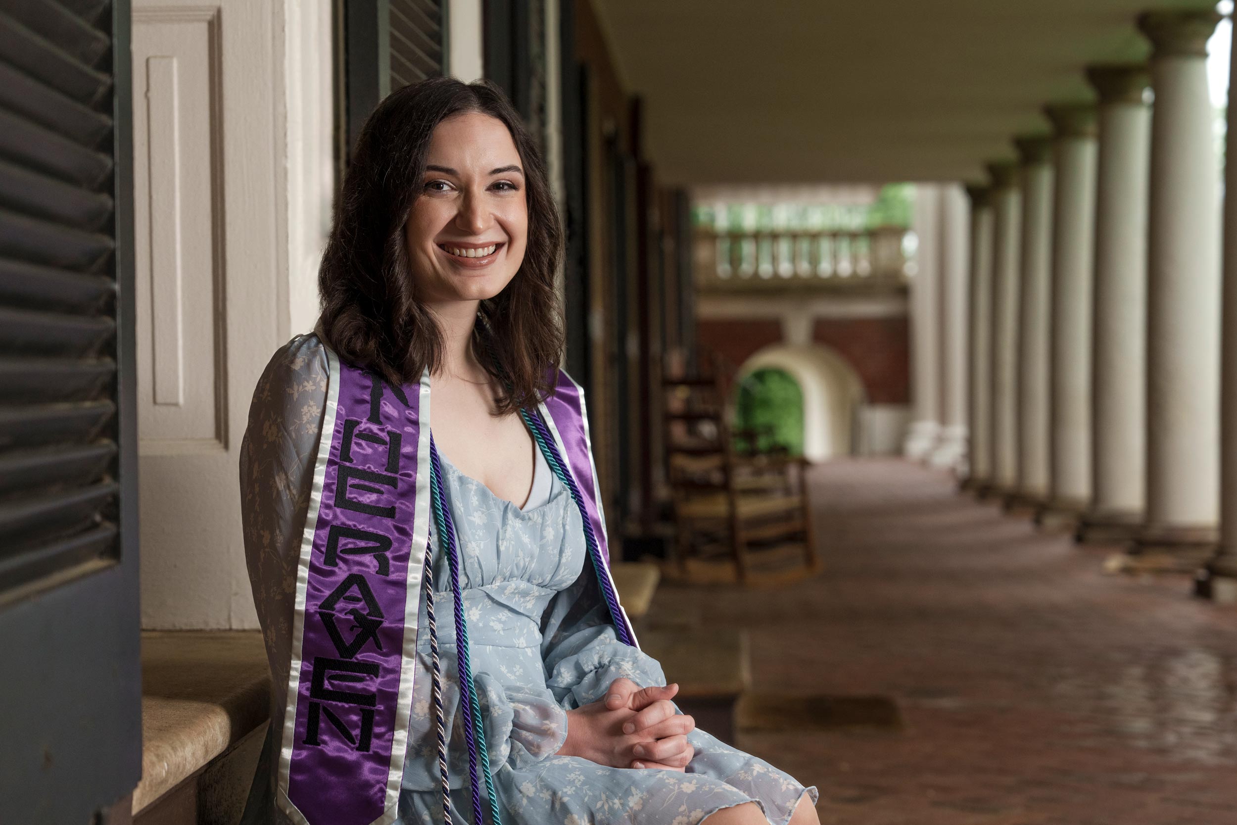 Portrait of Brittany Toth sitting by a Lawn room