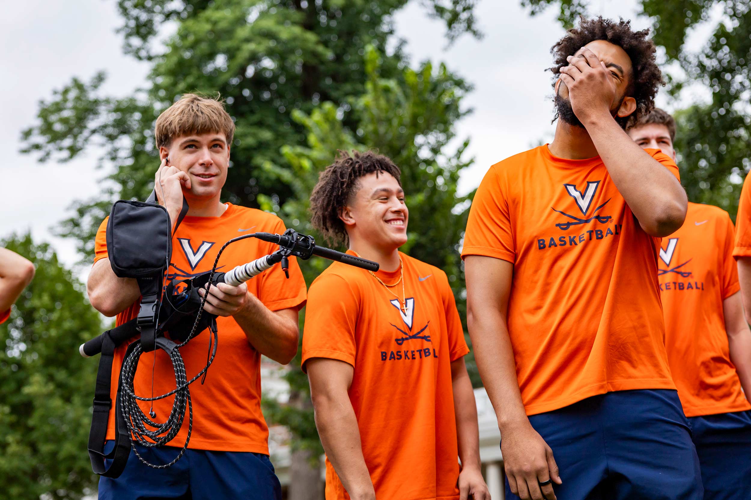 Portrait of group of UVA basketball players.