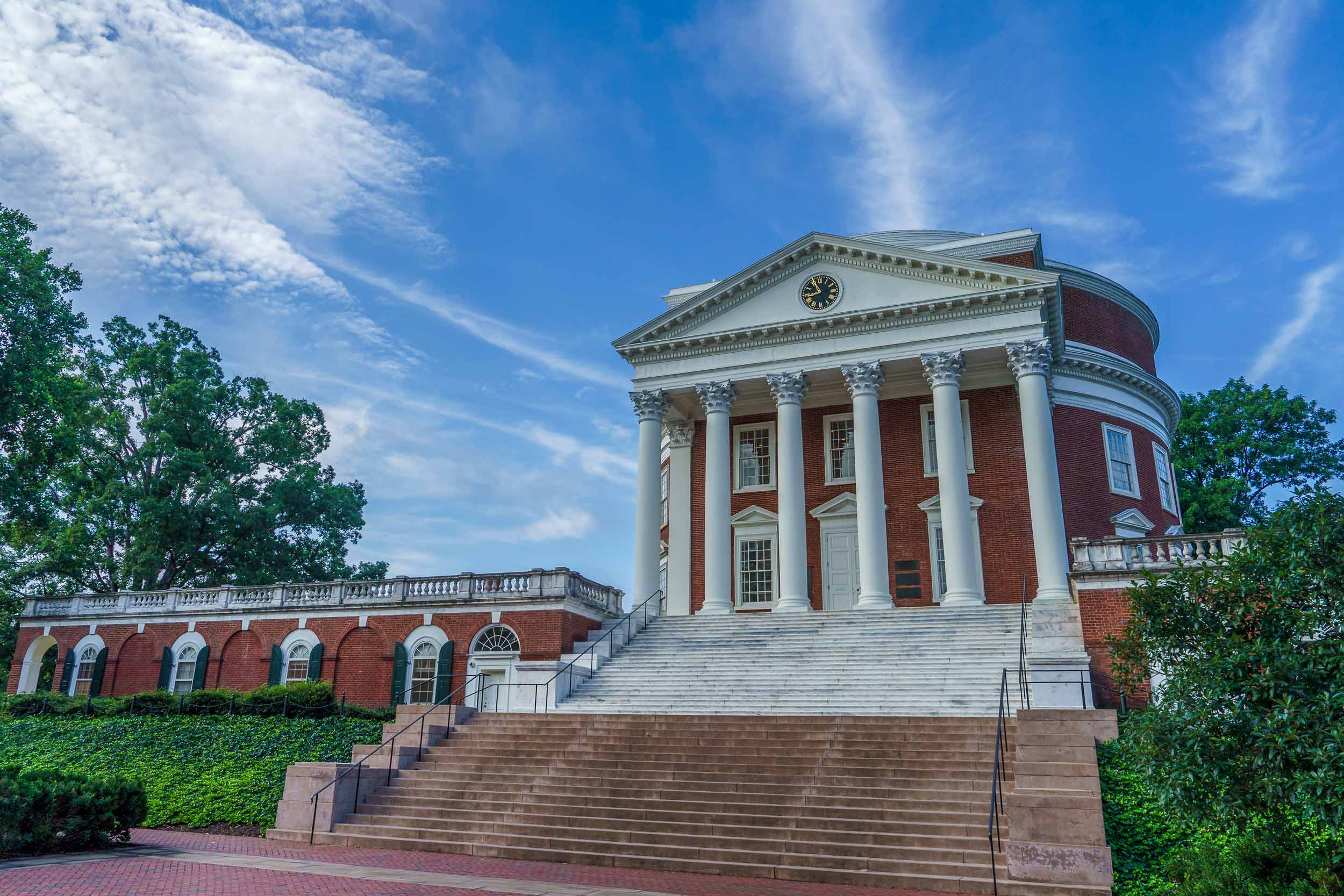 the steps of the UVA Rotunda on a slightly cloudy afternoon