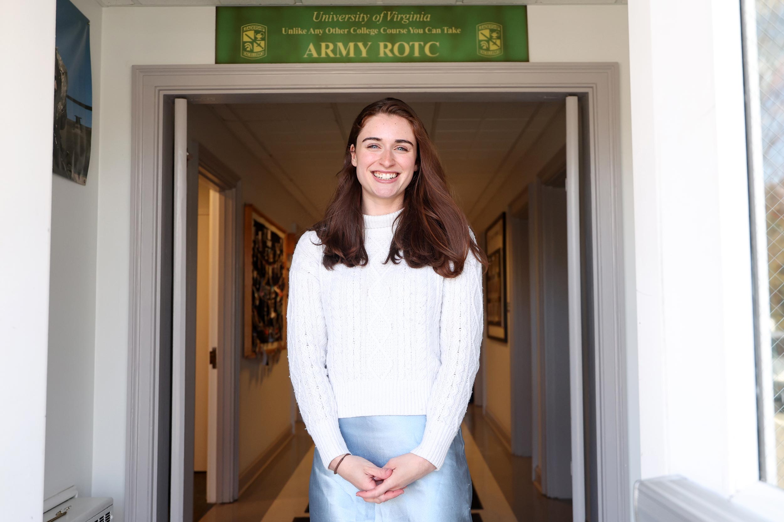 Portrait of Rebecca Fitch in front of the UVA ROTC classrooms