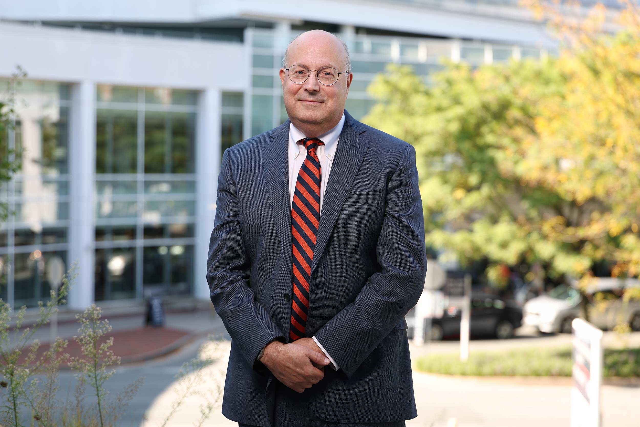 Dr. Mitchell Rosner standing in front of UVA hospital