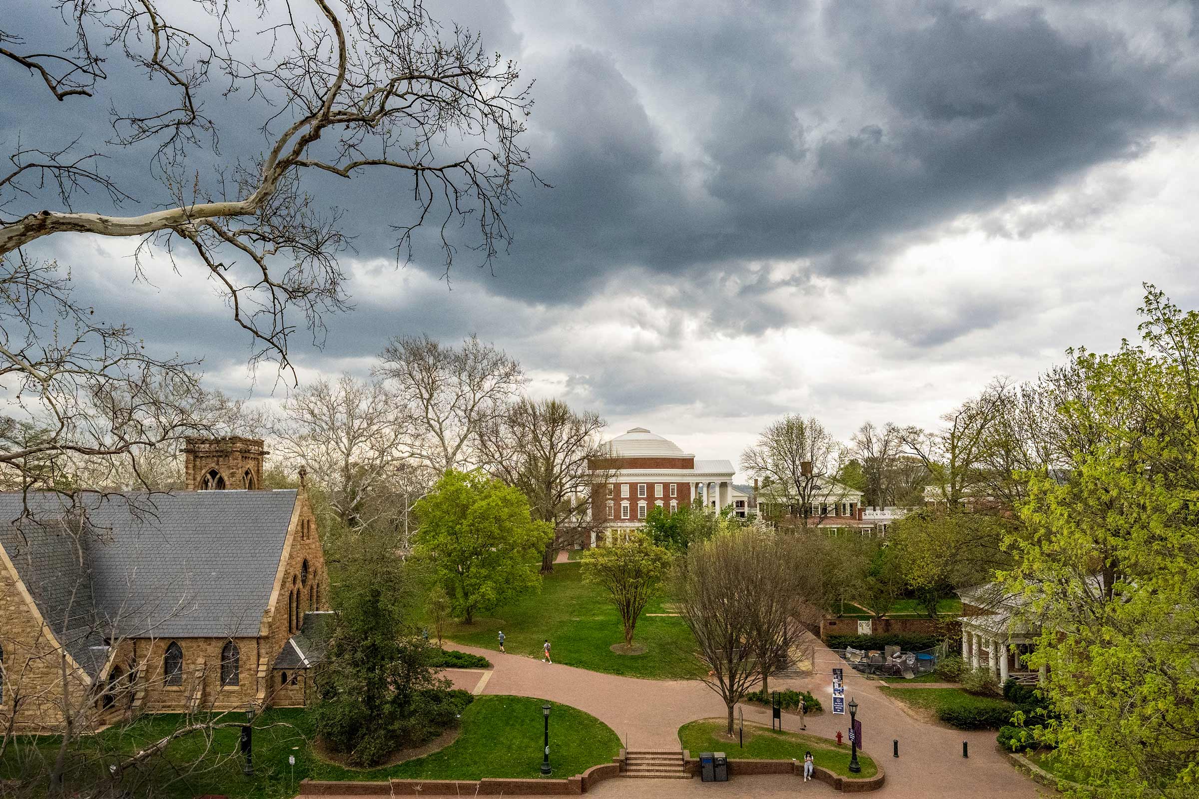 The UVA Rotunda seen from a distance, under a cloudy sky