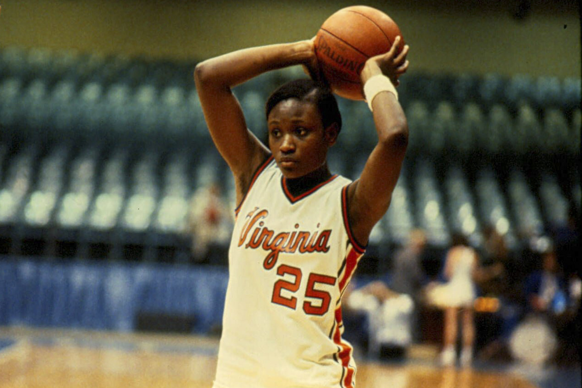 Cathy Grimes-Miller preparing to pass a basketball