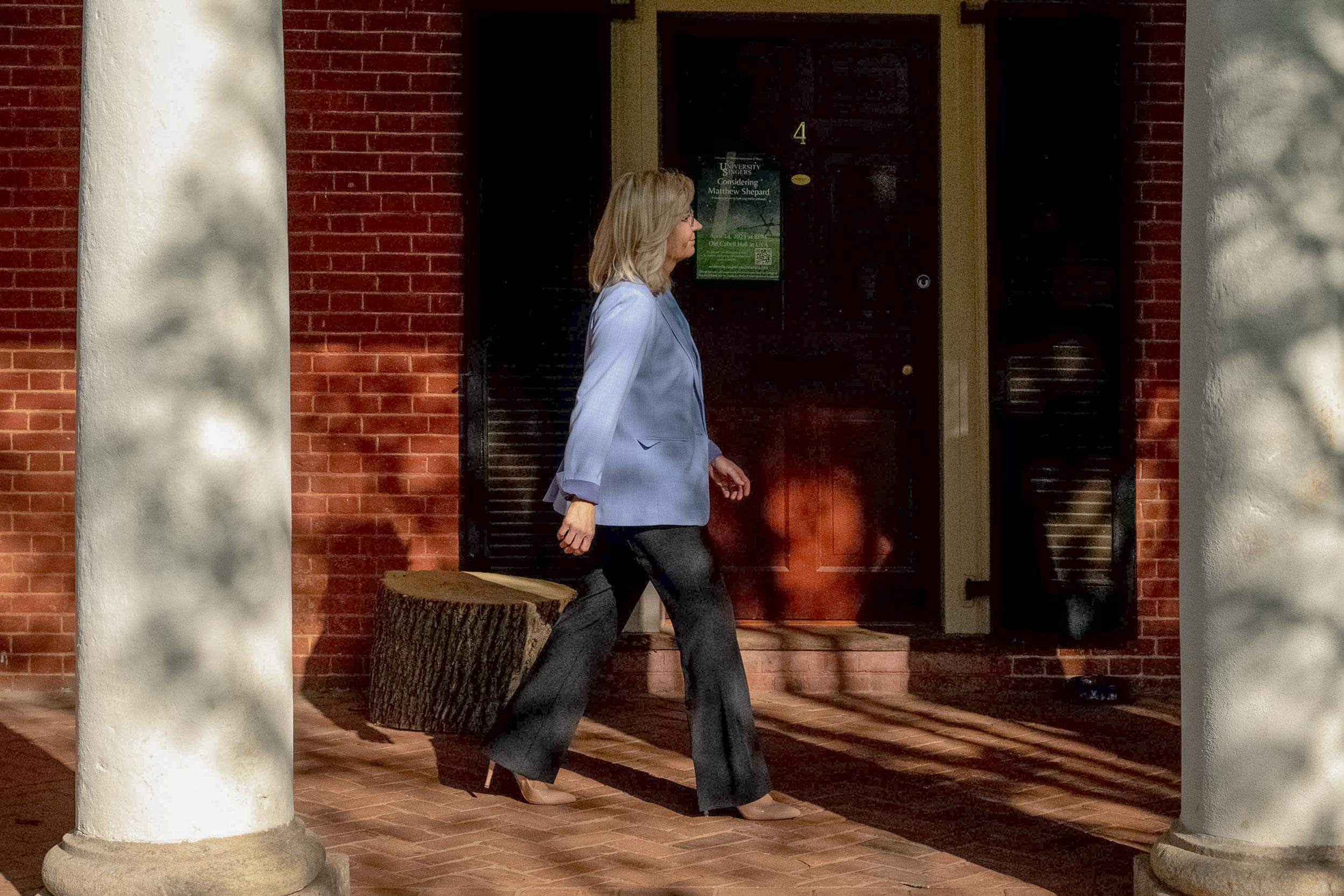 Former U.S. Rep. Liz Cheney walking along the Lawn rooms