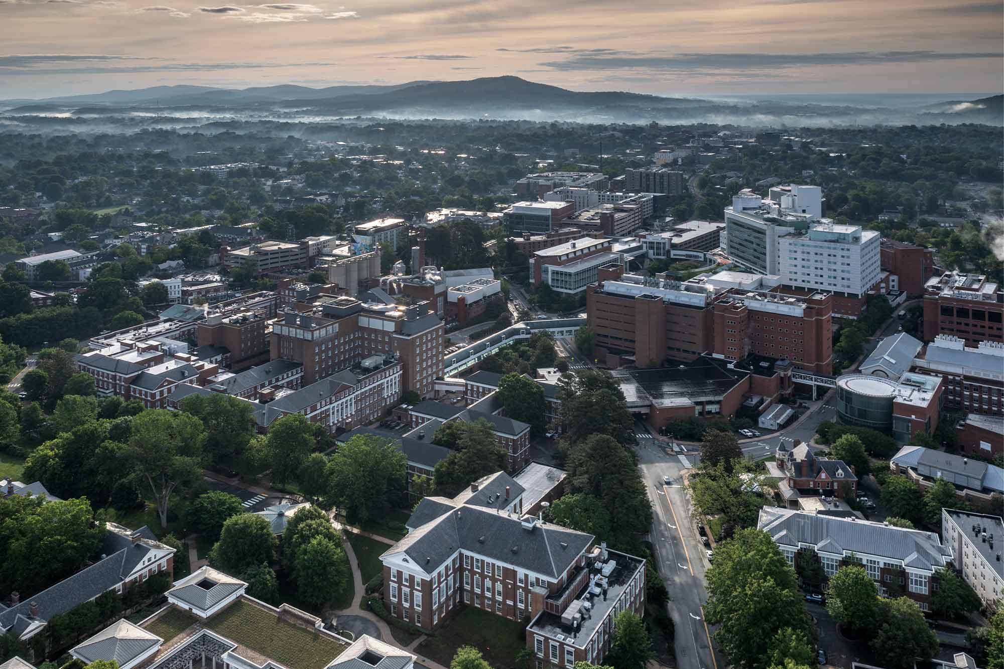 Aerial view of the UVA Health system at sunset