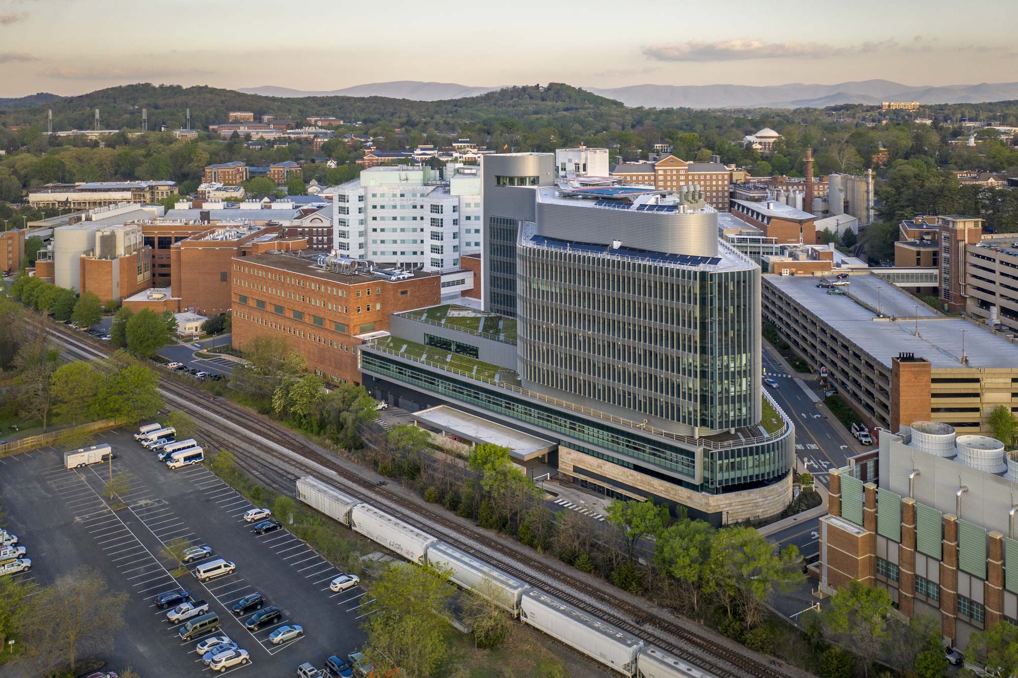 Aerial photo of Medical Center hospital buildings on UVA Health campus in Charlottesville, Virginia.