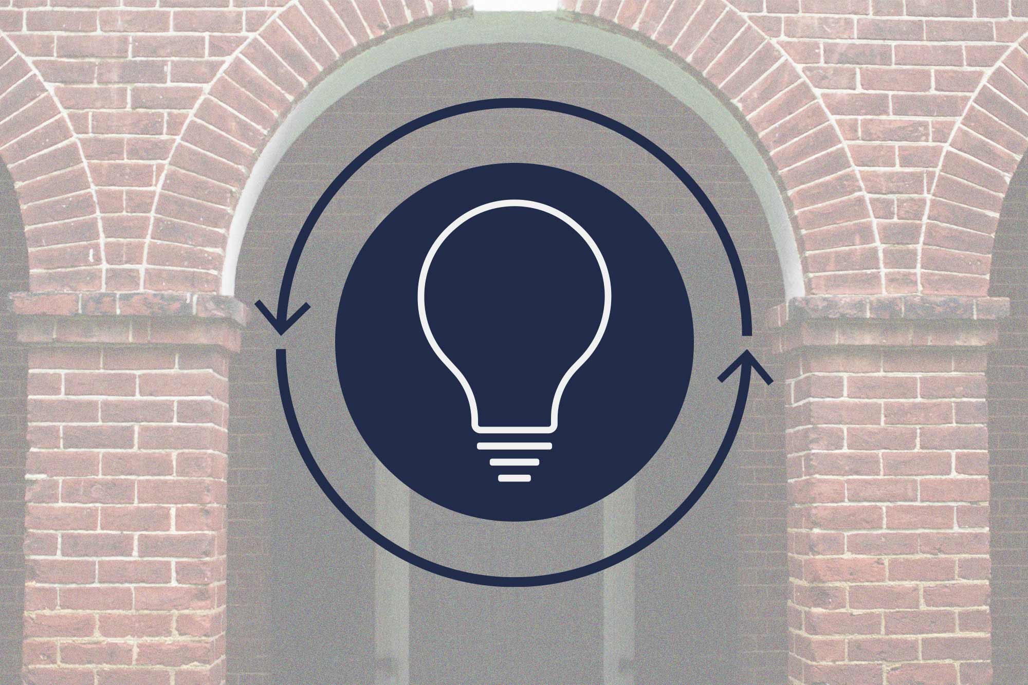 A photo illustration of a light bulb within a blue circle, surrounded by rotating arrows in front of brick pillars.