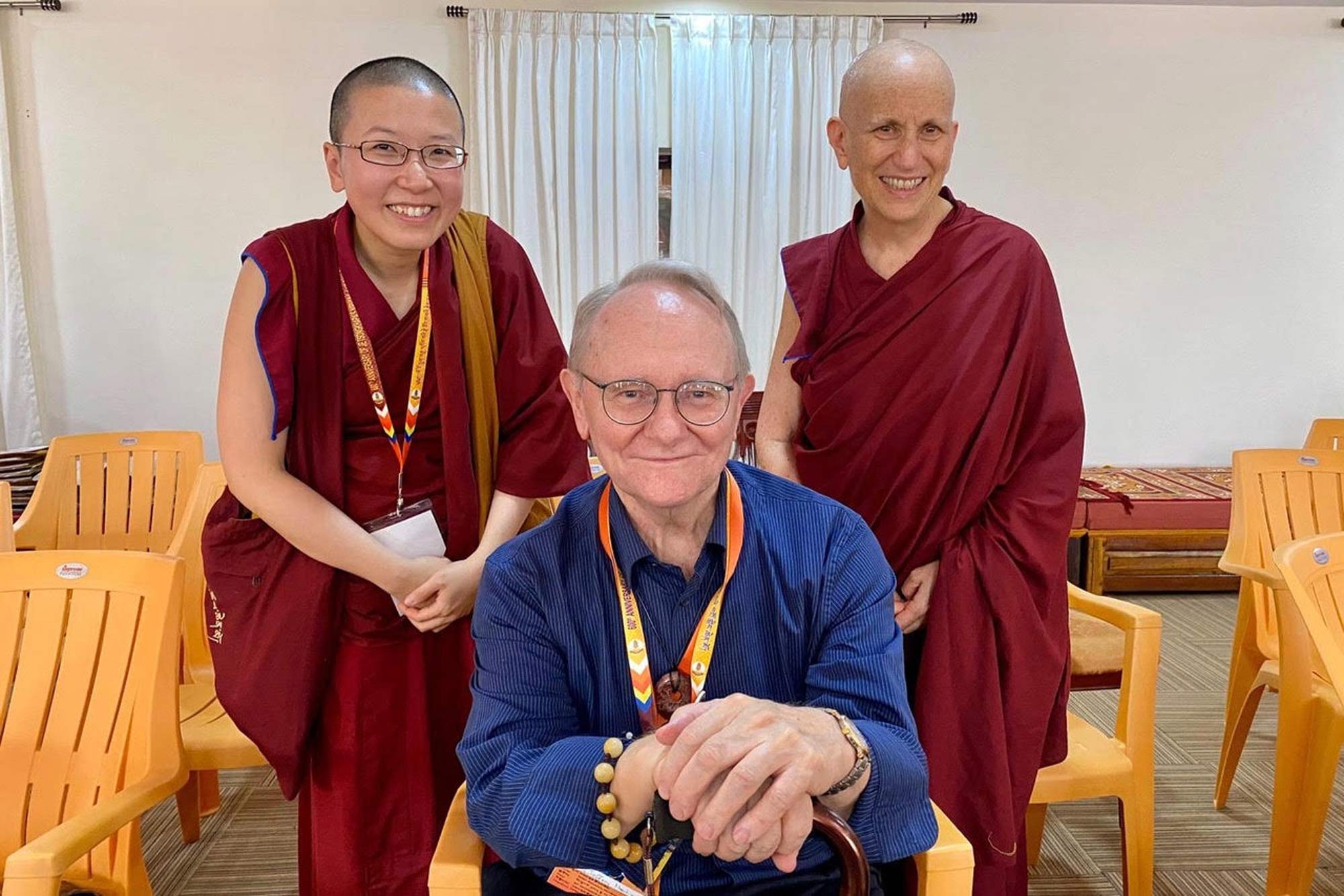 Jeffrey Hopkins in the middle with two Buddhist nuns.