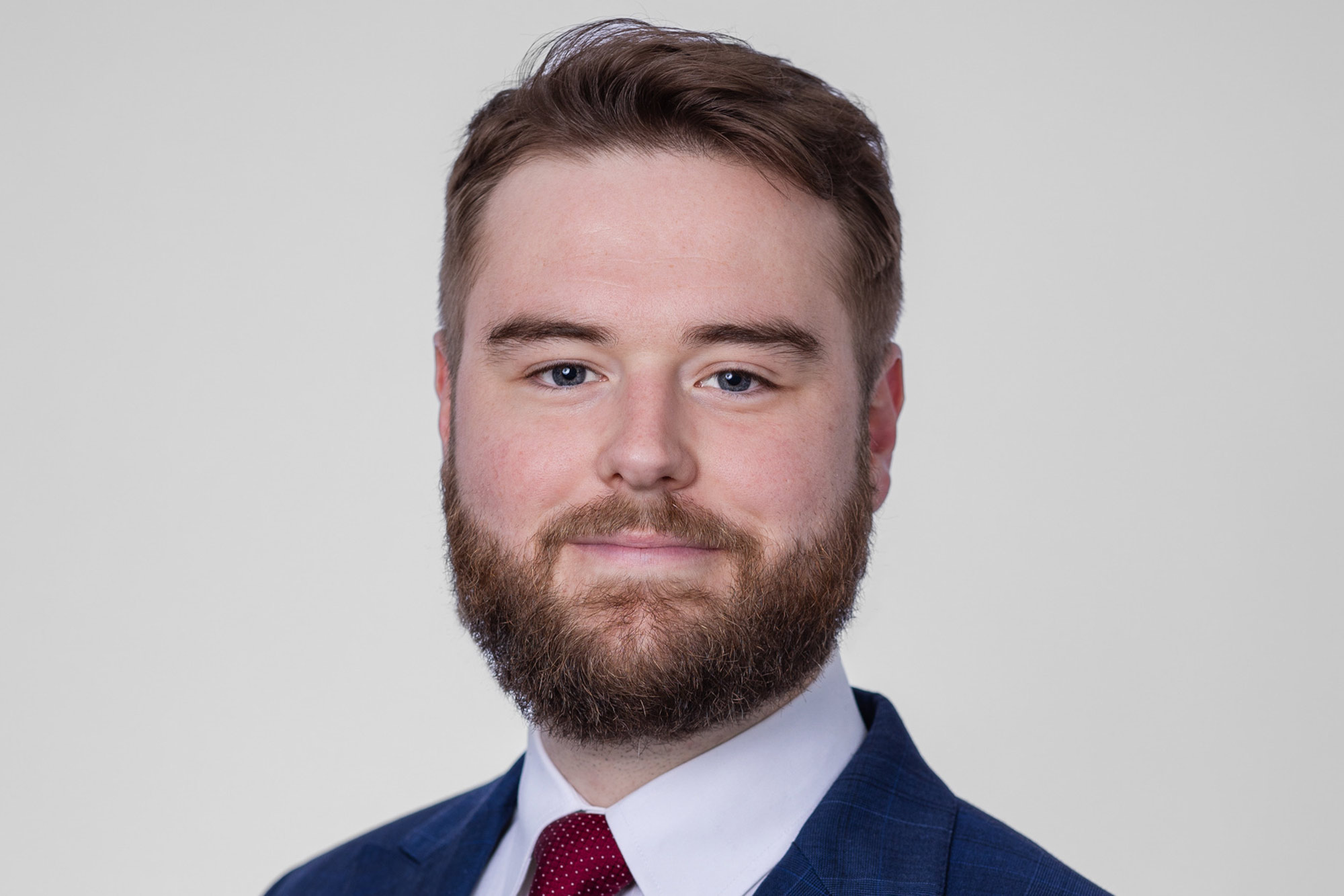 A headshot of UVA Law student Kirk Wolff