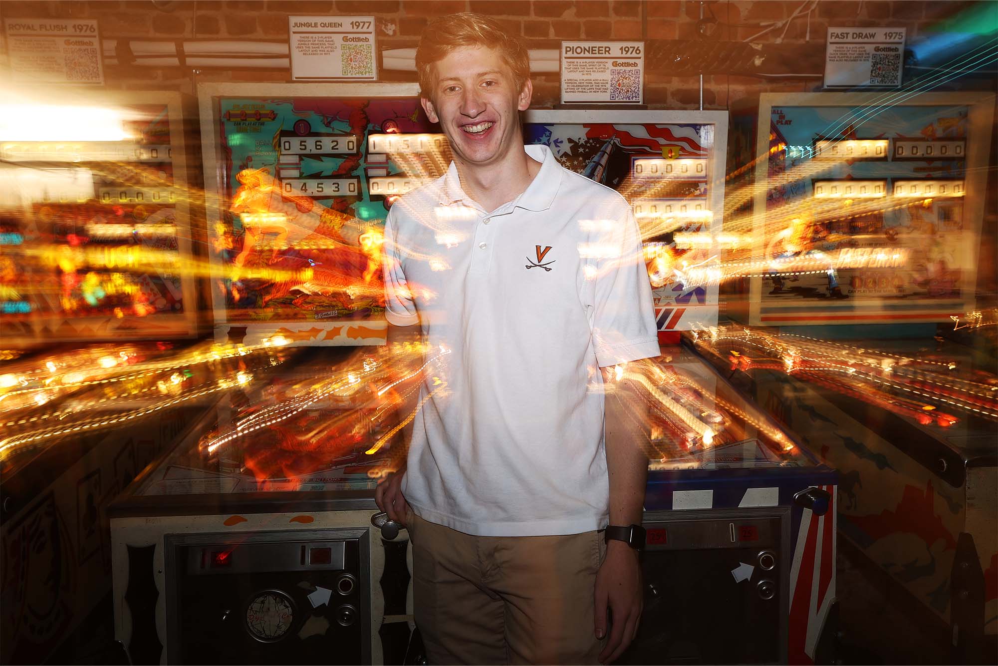 An overlay image of Colin in front of pinball machines