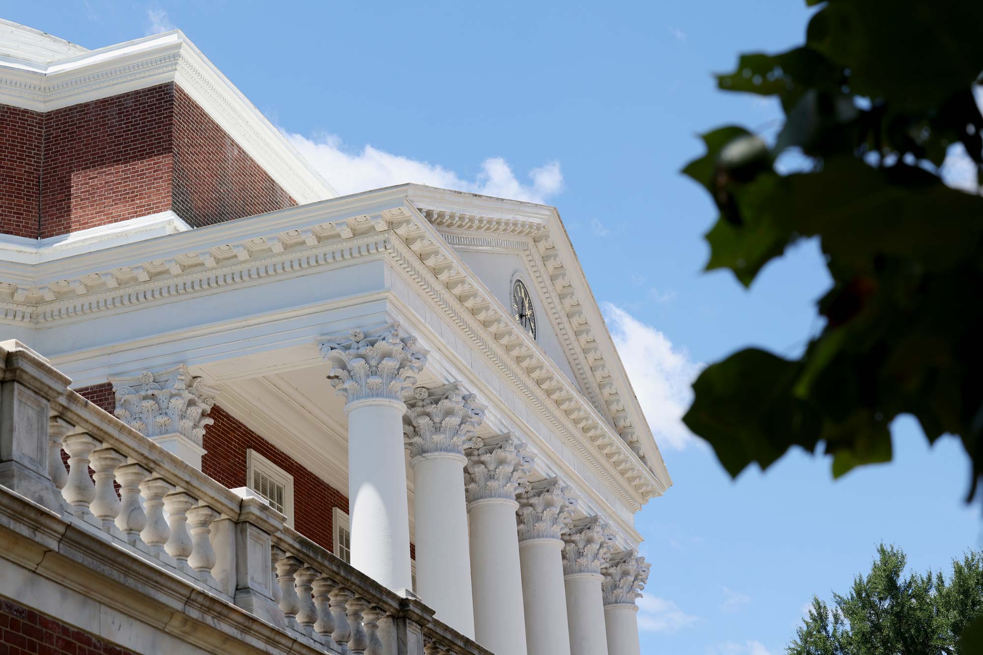 A side profile of the Rotunda during a bright blue day