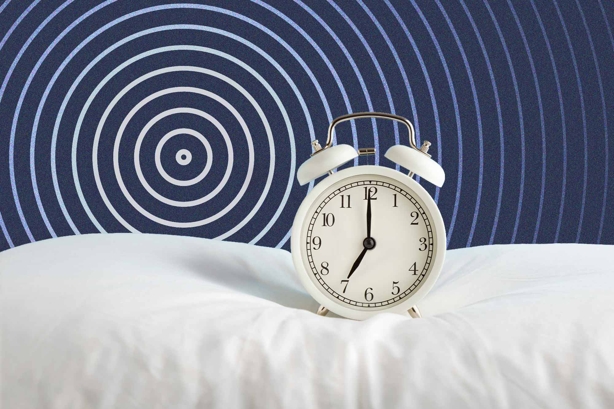 Illustration of a spiral overlayed with a photo of an alarm clock on a bed