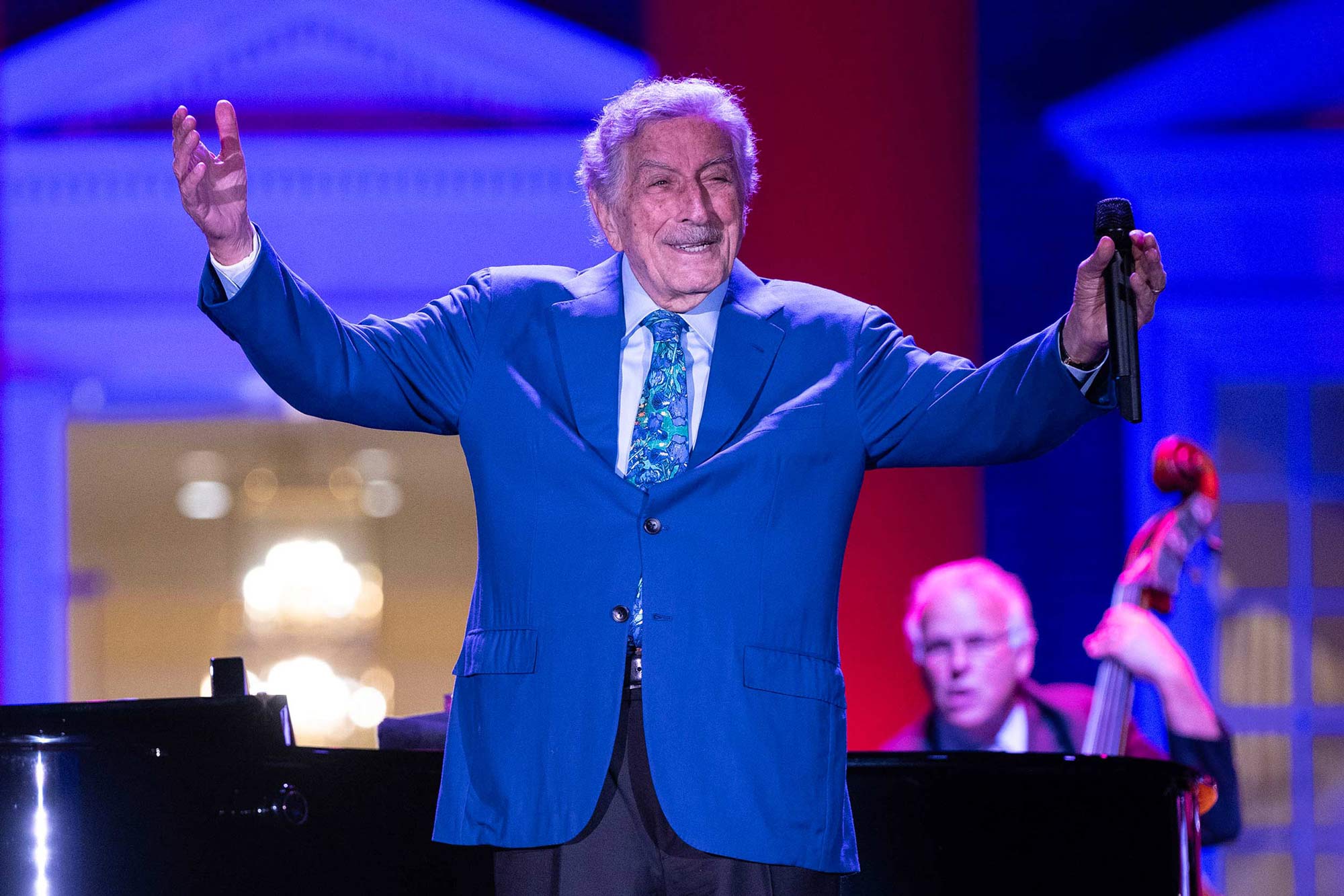 Candid of Tony Bennett on stage in front of the Rotunda
