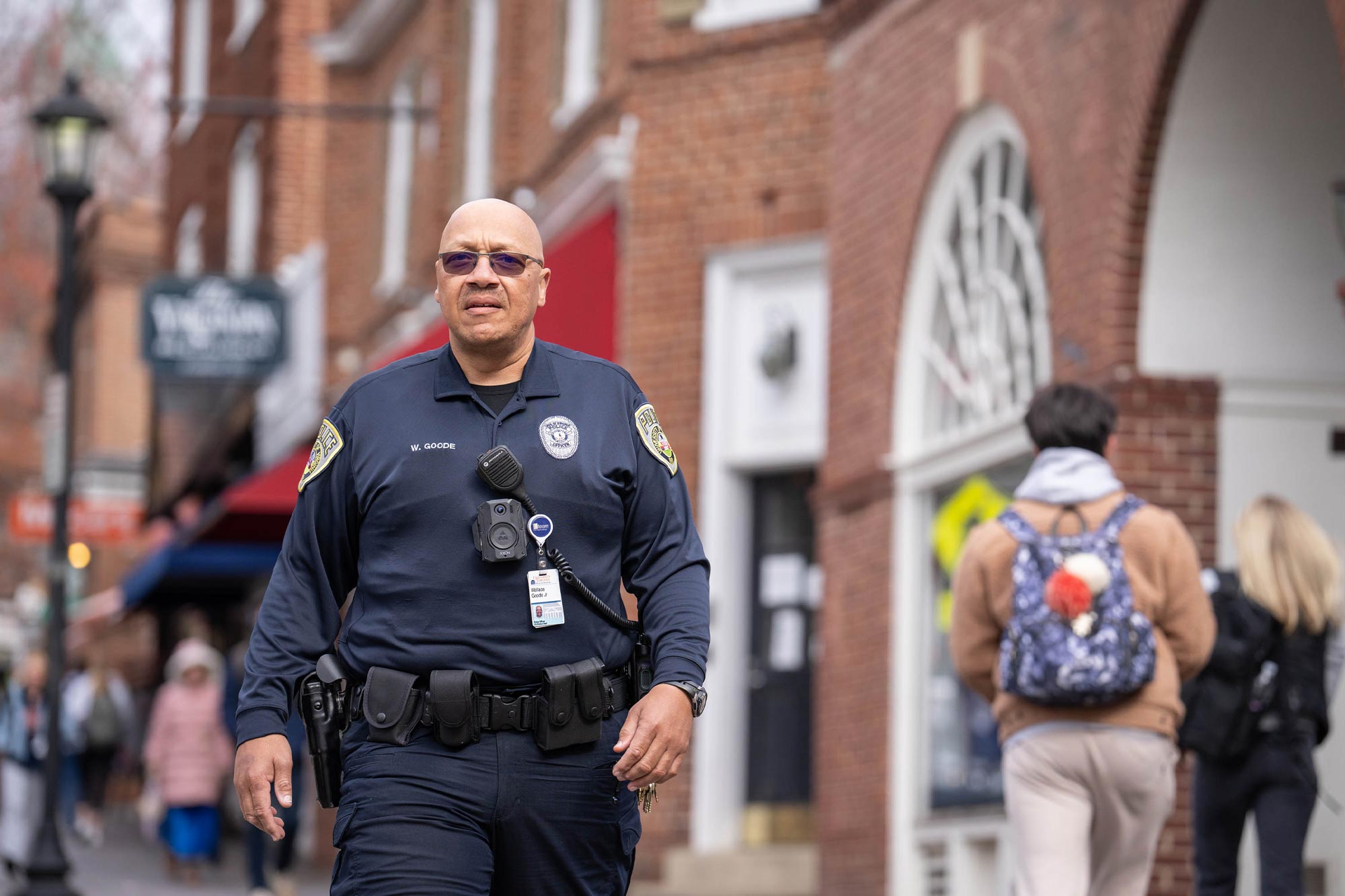 University Police Department officer Wallace Goode patrols along the Corner