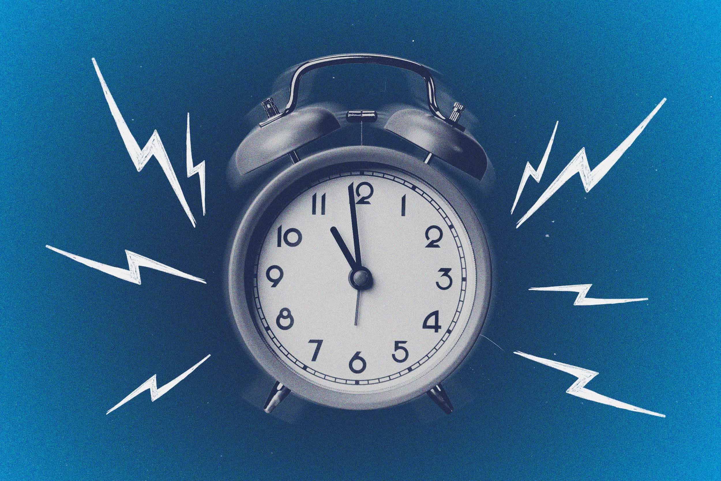 Alarm clock with lightning bolts indicating sound