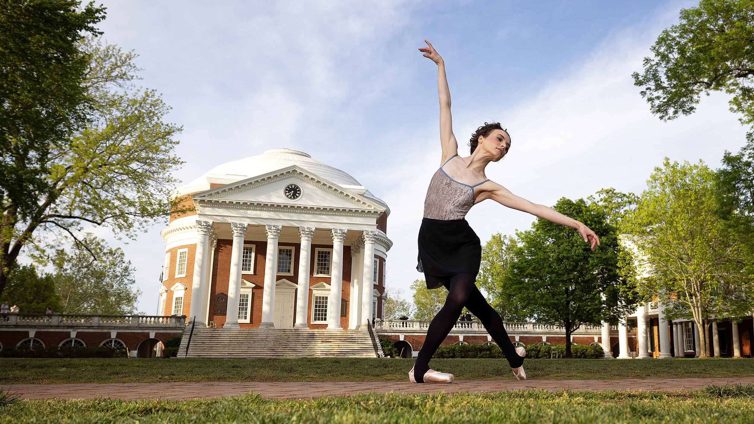 Molly Yeo dances in front of the Rotunda